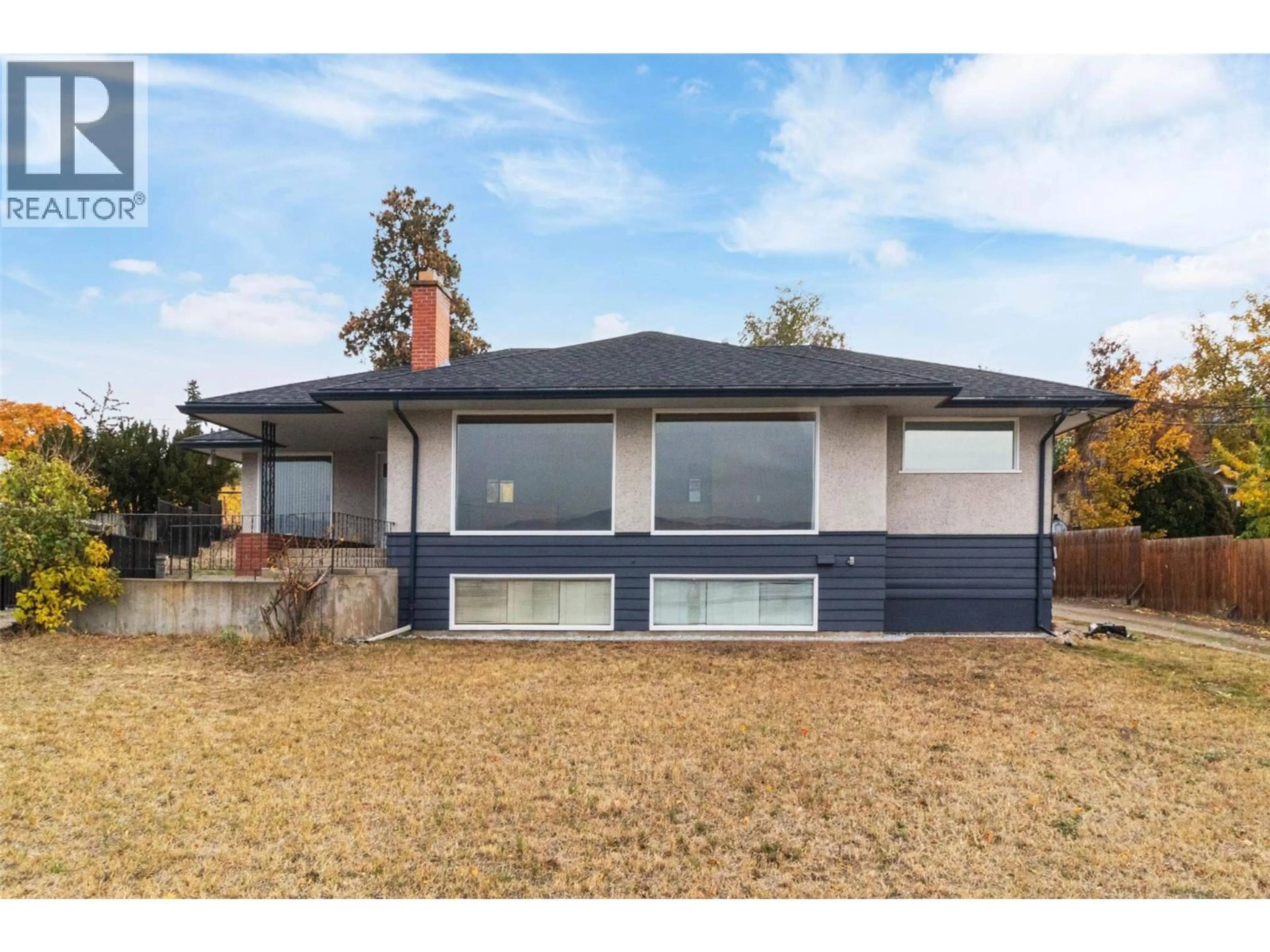 Home with vinyl exterior material, street for 4829 LAKESHORE ROAD, Kelowna British Columbia V1W4H6
