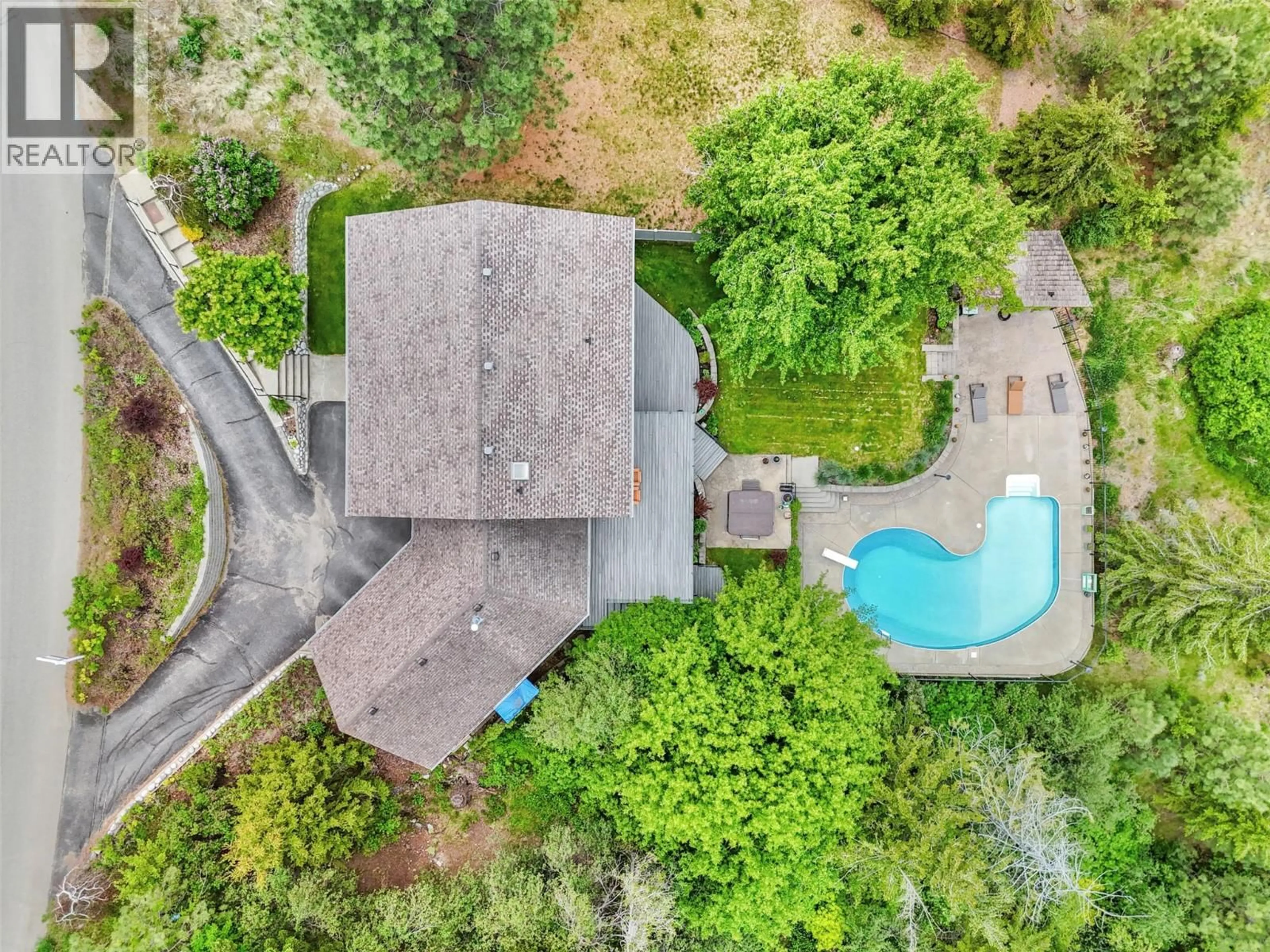 A pic from outside/outdoor area/front of a property/back of a property/a pic from drone, unknown for 1978 HIGH SCHYLEA DRIVE, Kamloops British Columbia V2E1K9