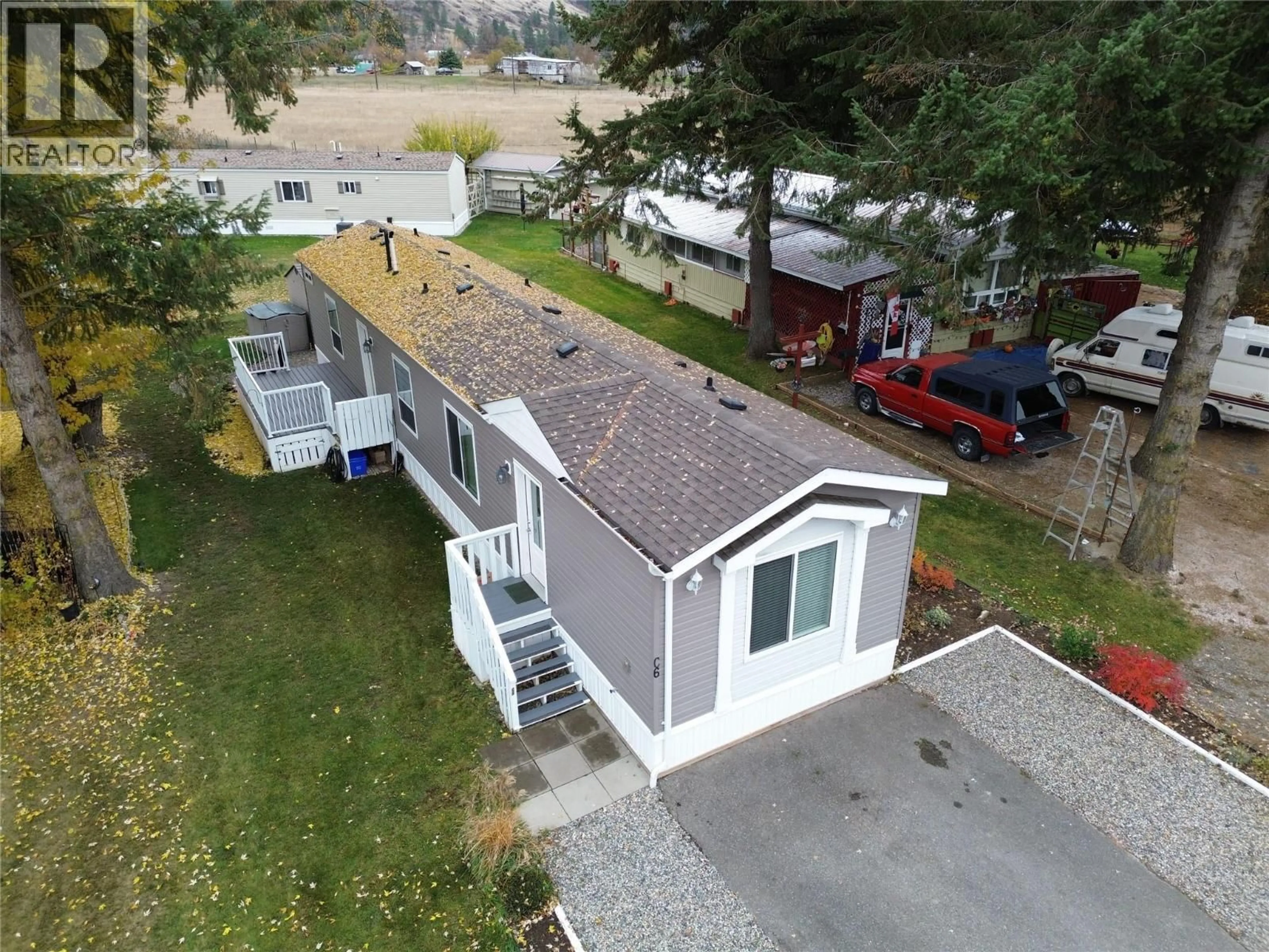 A pic from outside/outdoor area/front of a property/back of a property/a pic from drone, building for C6 - 5455 ALMOND GARDENS ROAD, Grand Forks British Columbia V0H1H4