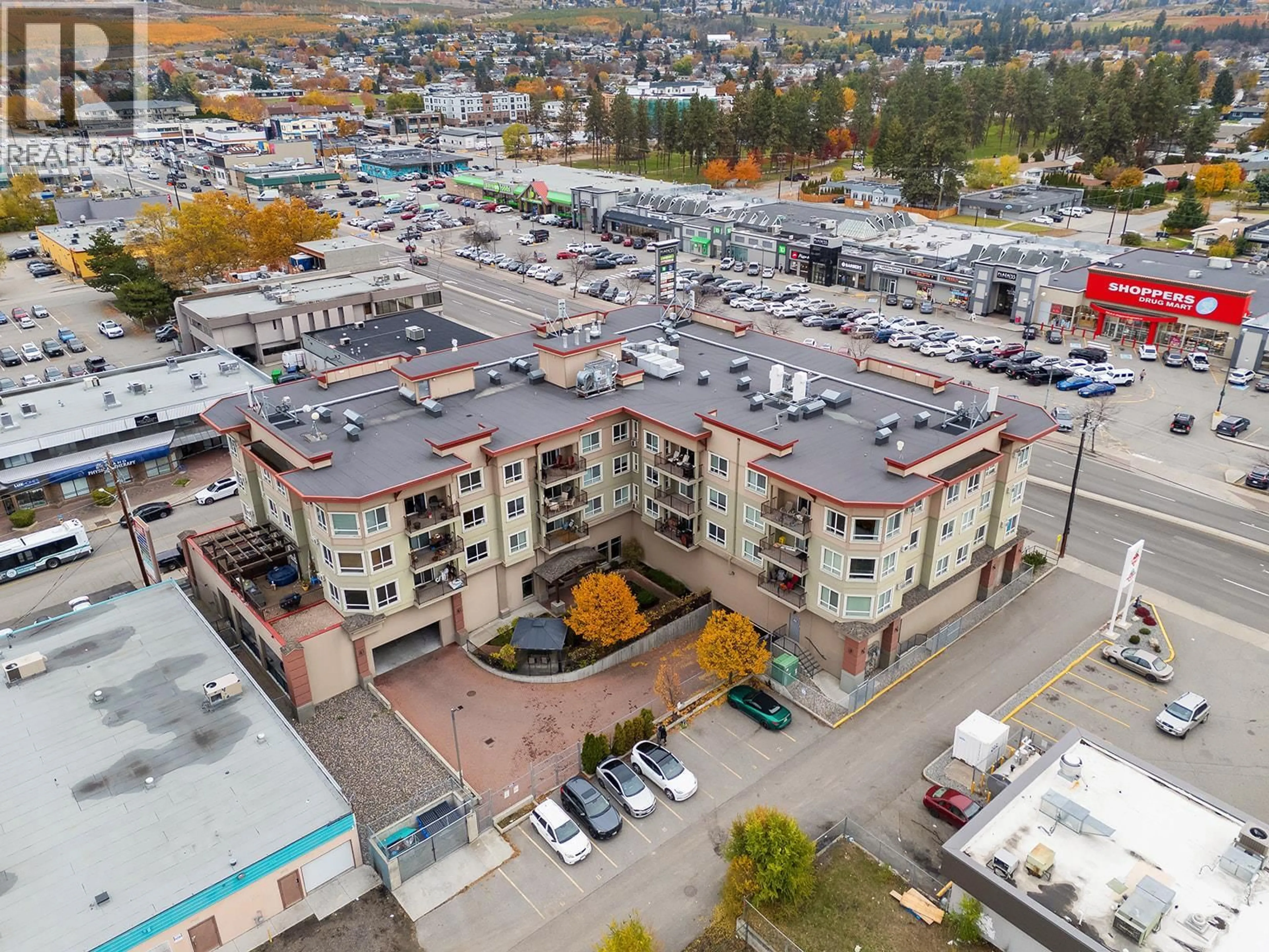 A pic from outside/outdoor area/front of a property/back of a property/a pic from drone, unknown for 412 - 140 ASHER ROAD, Kelowna British Columbia V1X3H6