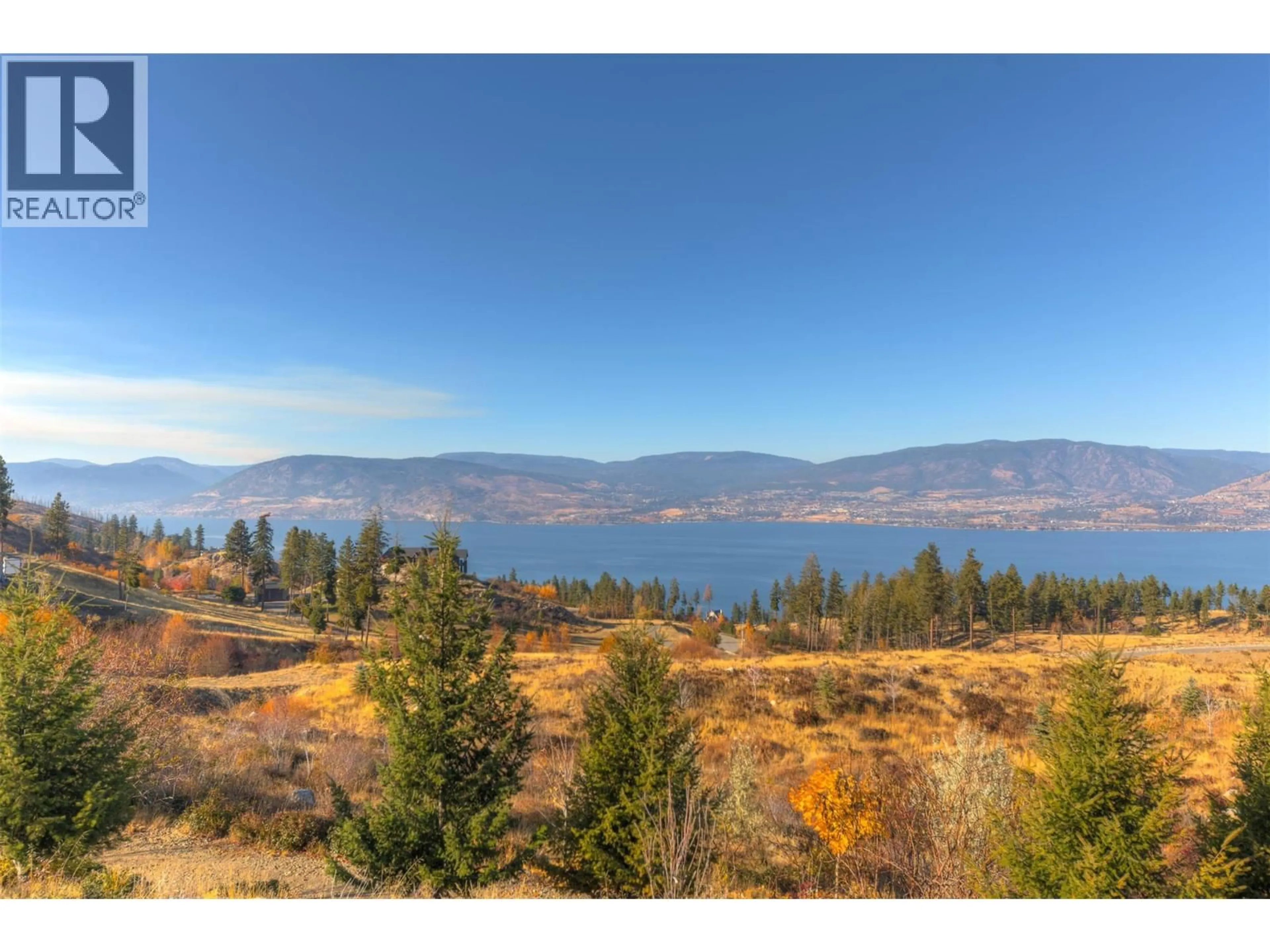 A pic from outside/outdoor area/front of a property/back of a property/a pic from drone, water/lake/river/ocean view for 105 TIMBERLINE ROAD, Kelowna British Columbia V1W4J6