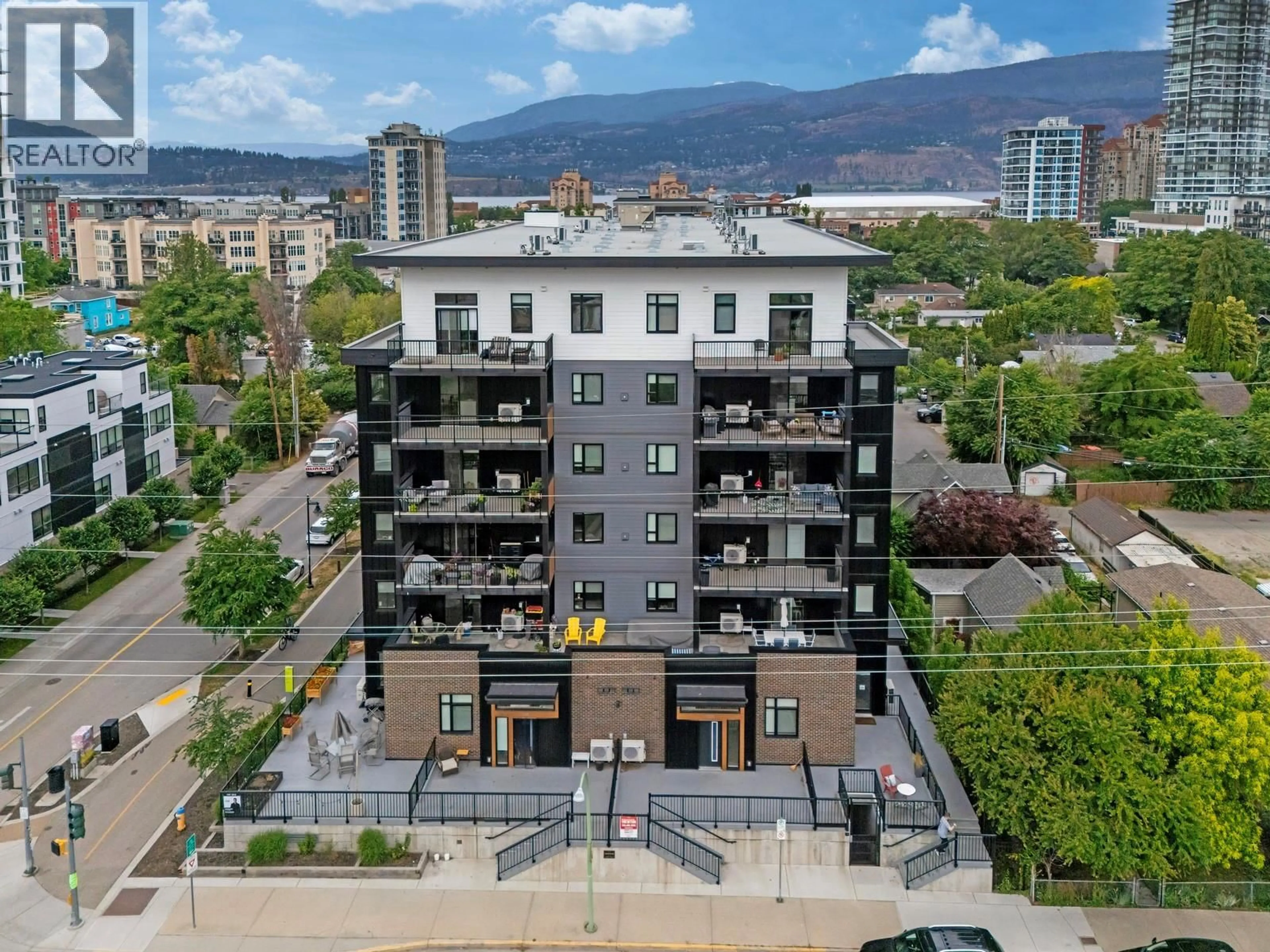 A pic from outside/outdoor area/front of a property/back of a property/a pic from drone, city buildings view from balcony for 209 - 660 CAWSTON AVENUE NORTH, Kelowna British Columbia V1Y9M1