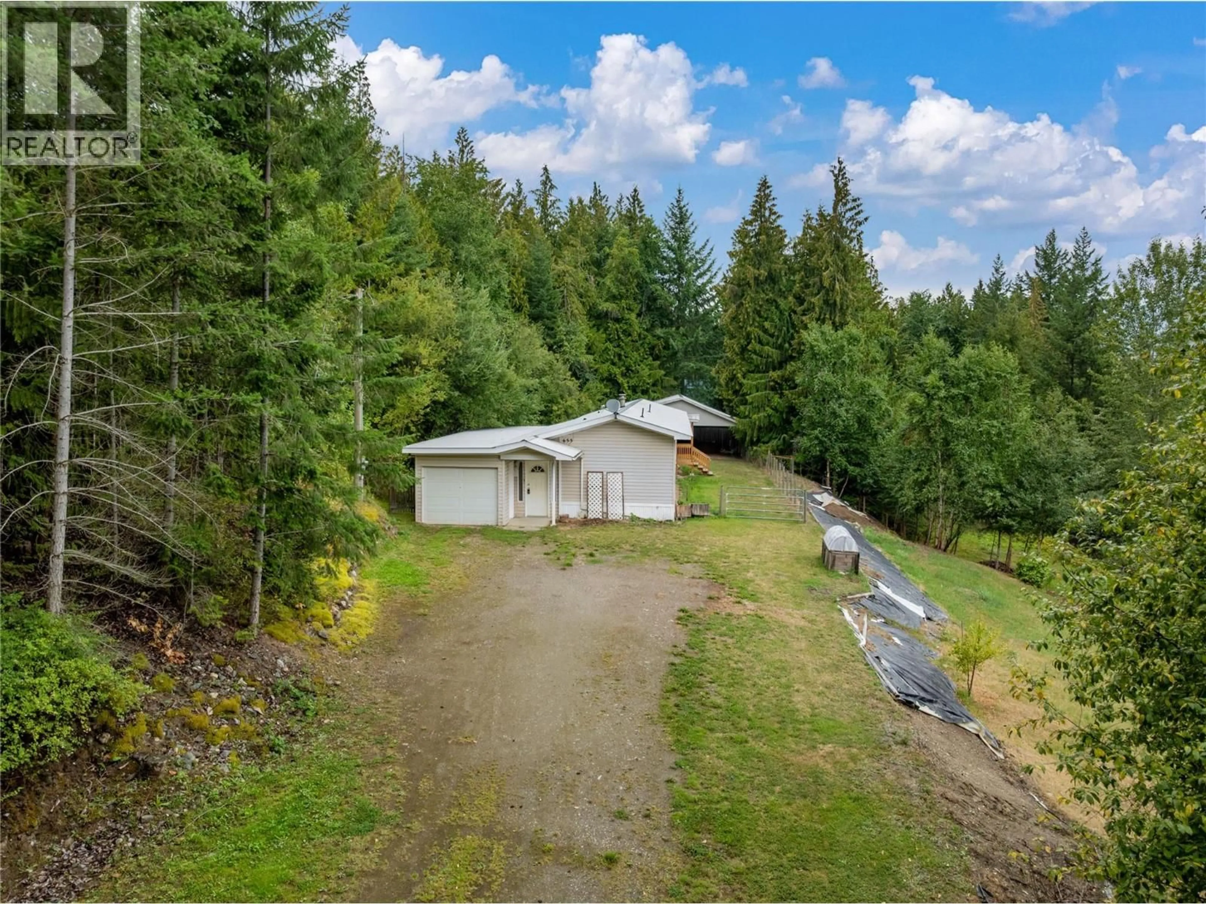 A pic from outside/outdoor area/front of a property/back of a property/a pic from drone, forest/trees view for 655 CAOUETTE ROAD, Sorrento British Columbia V0E2W1