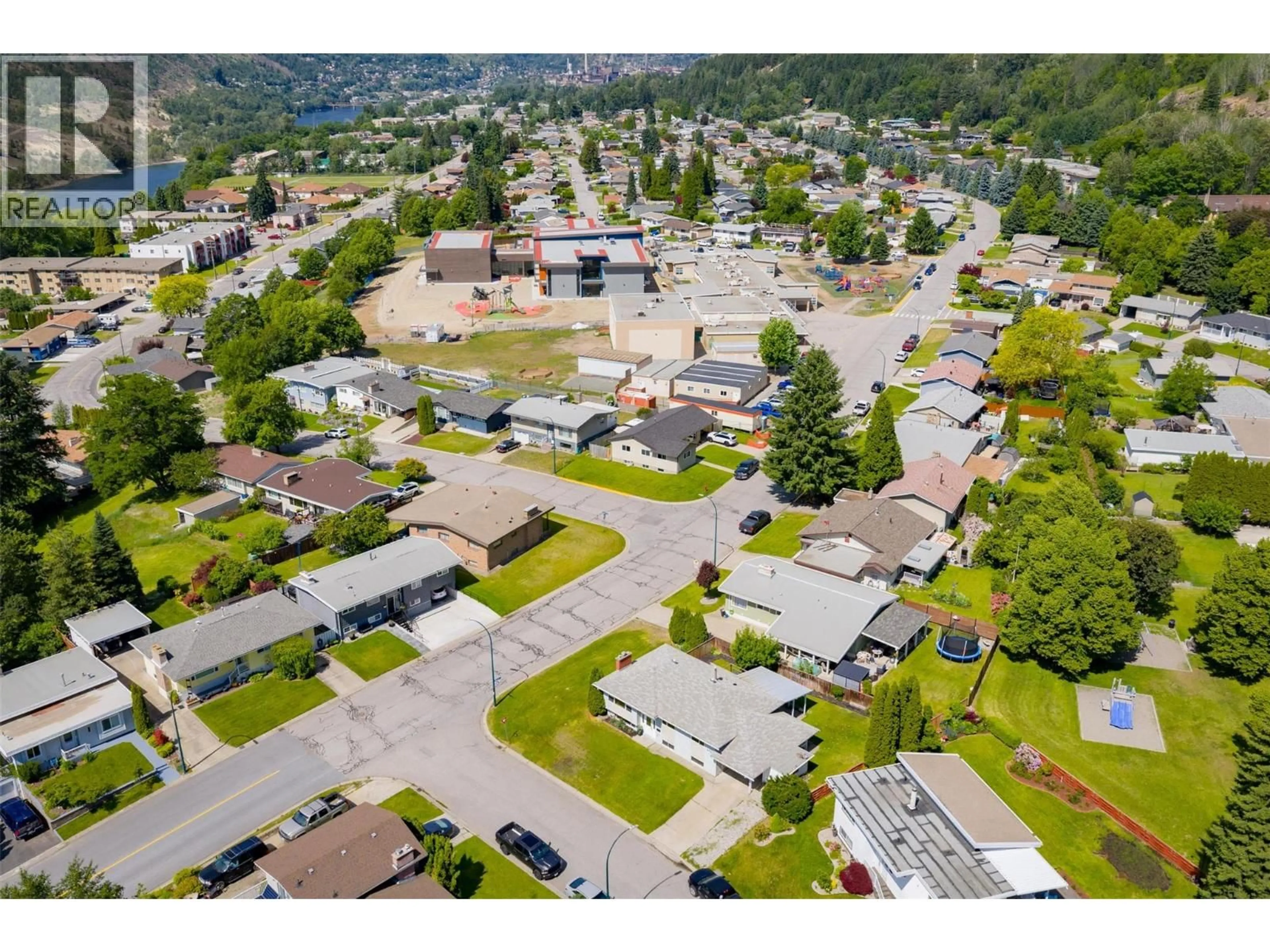 A pic from outside/outdoor area/front of a property/back of a property/a pic from drone, street for 3725 DOGWOOD DRIVE, Trail British Columbia V1R2V4