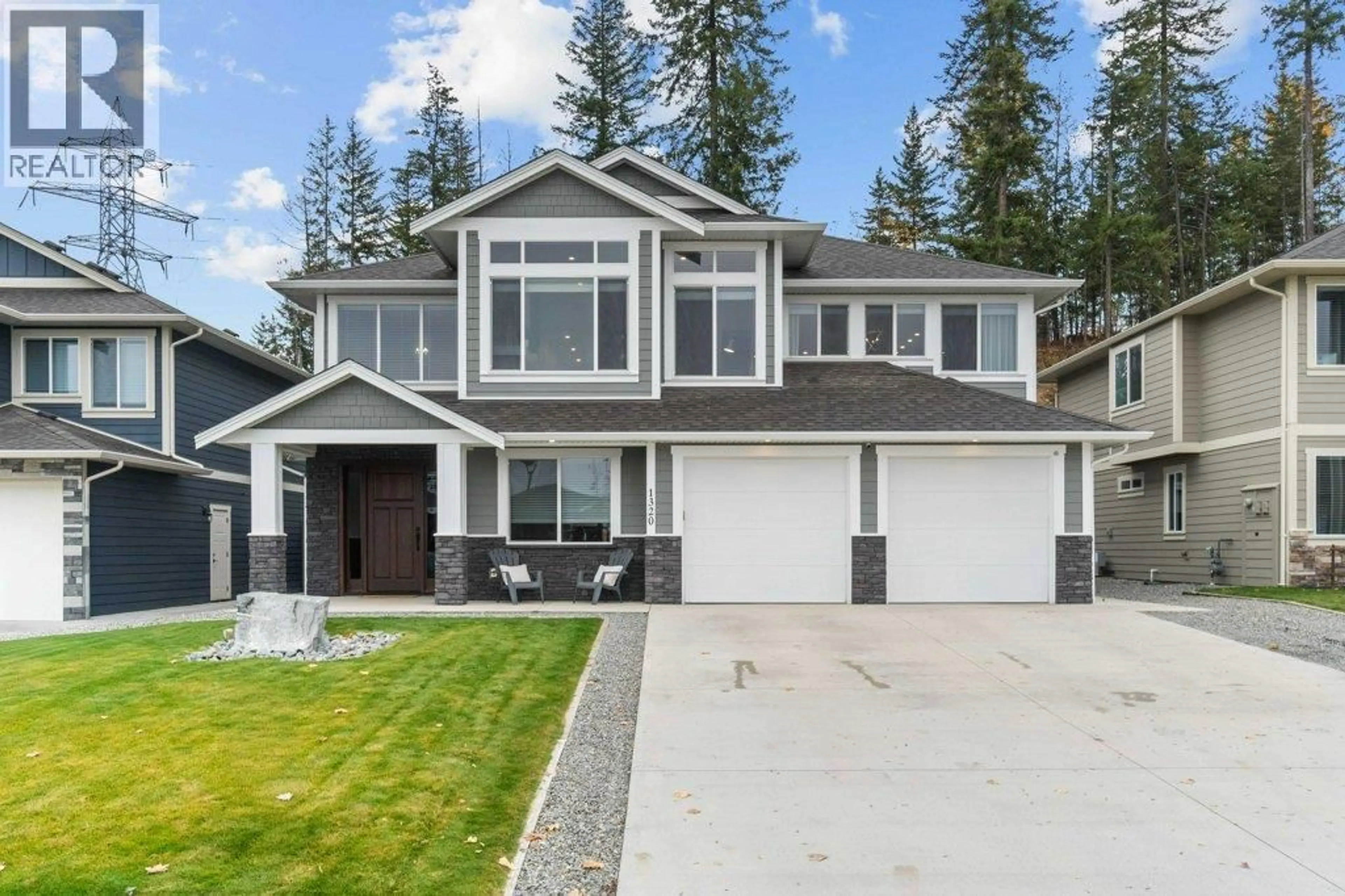 Home with vinyl exterior material, street for 1320 24 STREET SOUTHEAST, Salmon Arm British Columbia V1E0E3