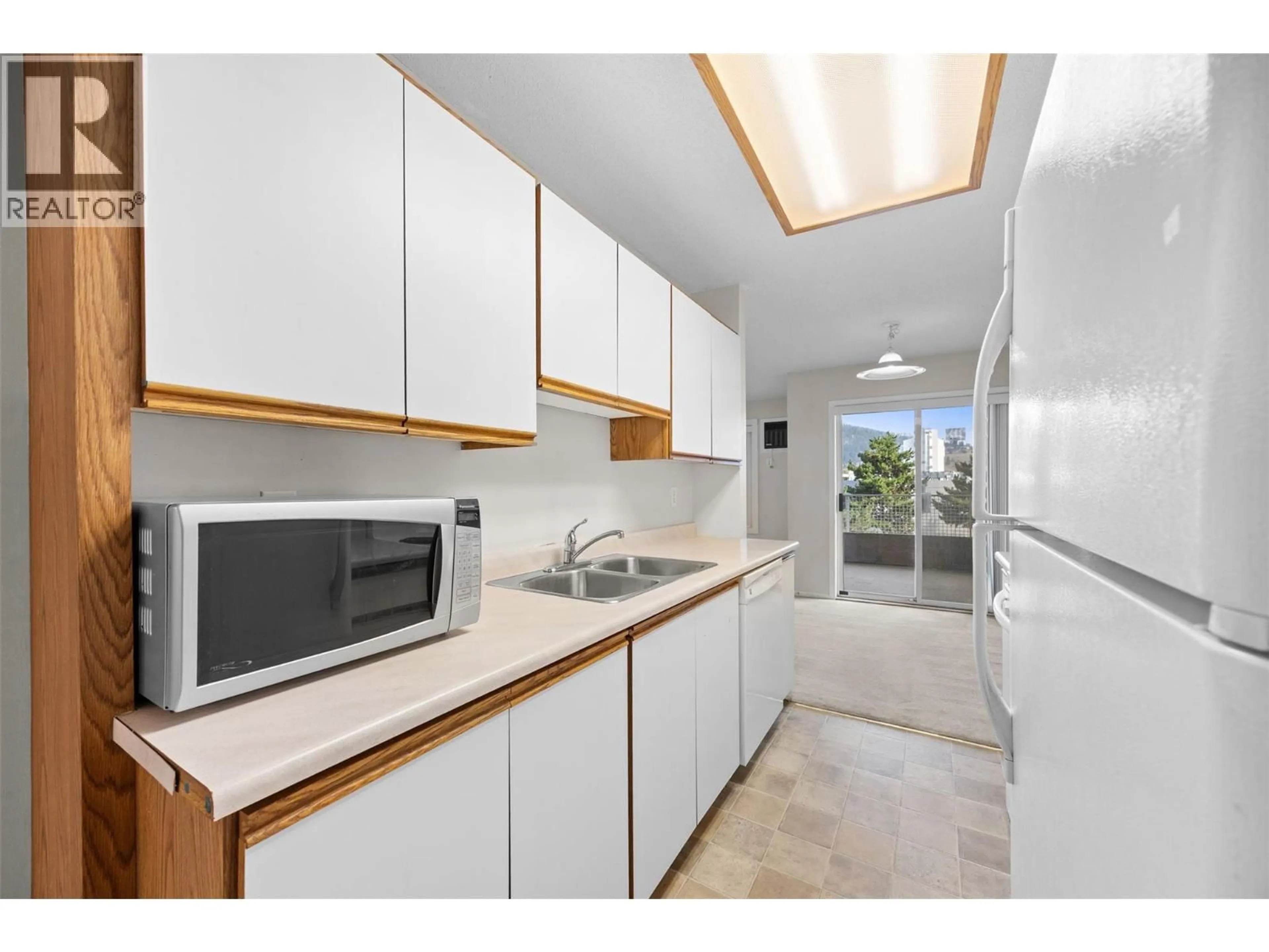 Standard kitchen, ceramic/tile floor for 307 - 2035 BARON ROAD, Kelowna British Columbia V1X7G3