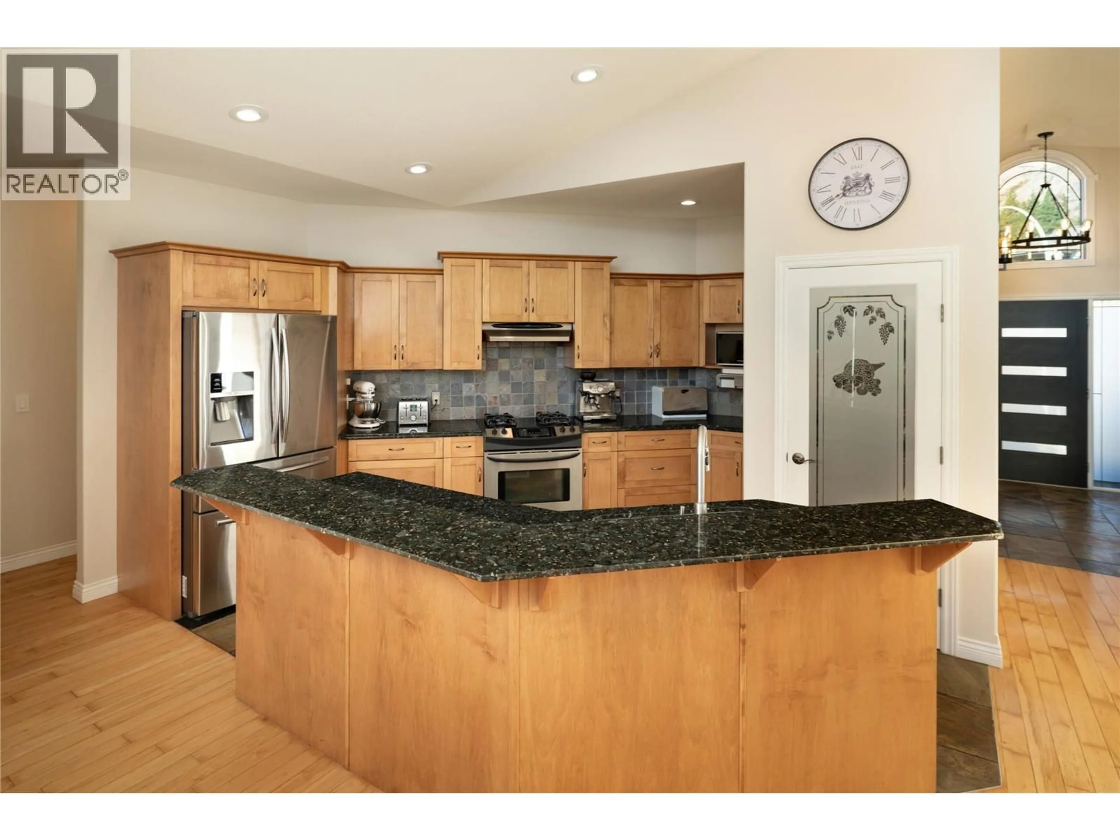 Open concept kitchen, ceramic/tile floor for 3356 MERLOT COURT, West Kelowna British Columbia V4T2W7