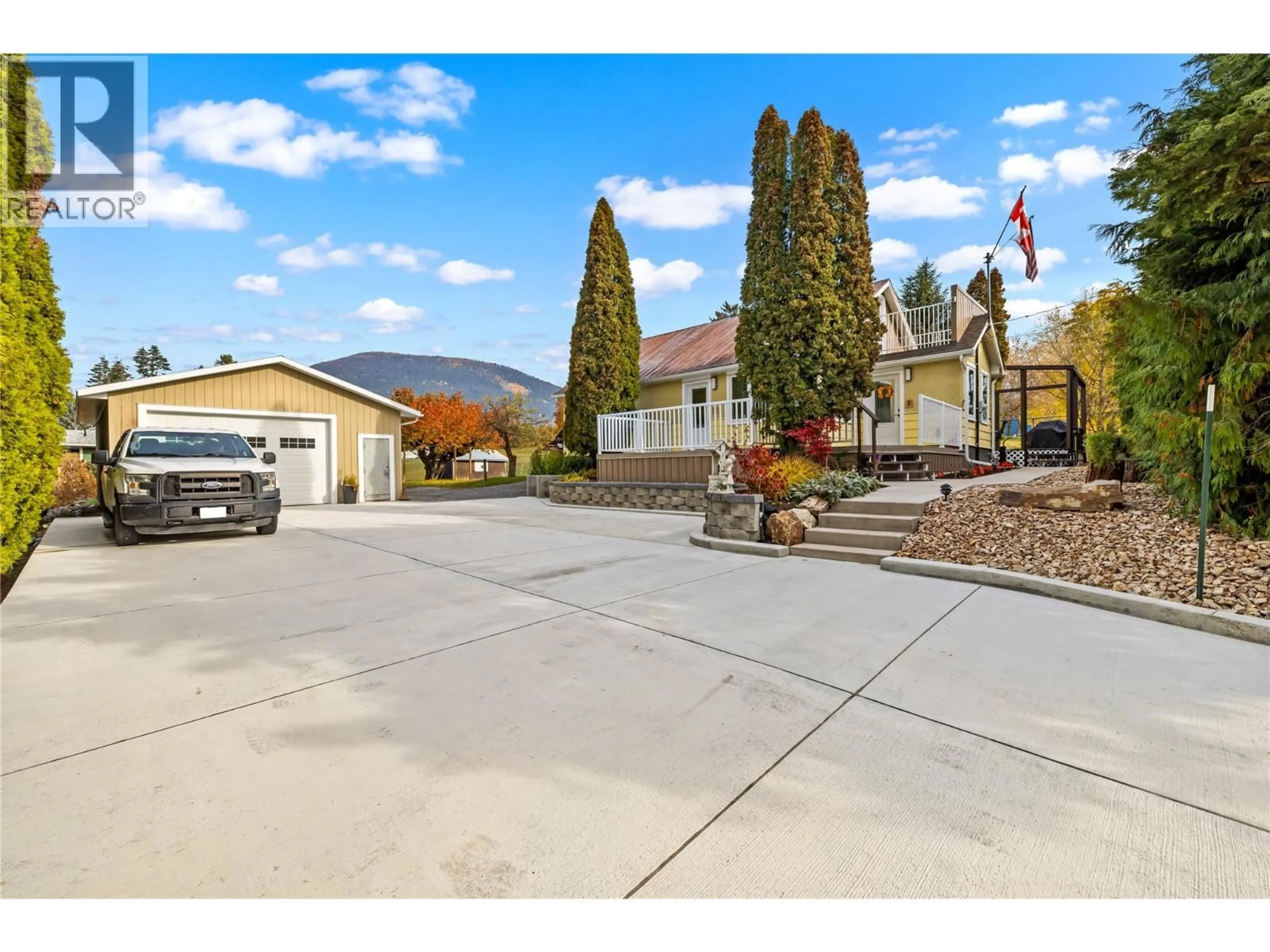 A pic from outside/outdoor area/front of a property/back of a property/a pic from drone, mountain view for 1130 ERICKSON STREET, Creston British Columbia V0B1G3