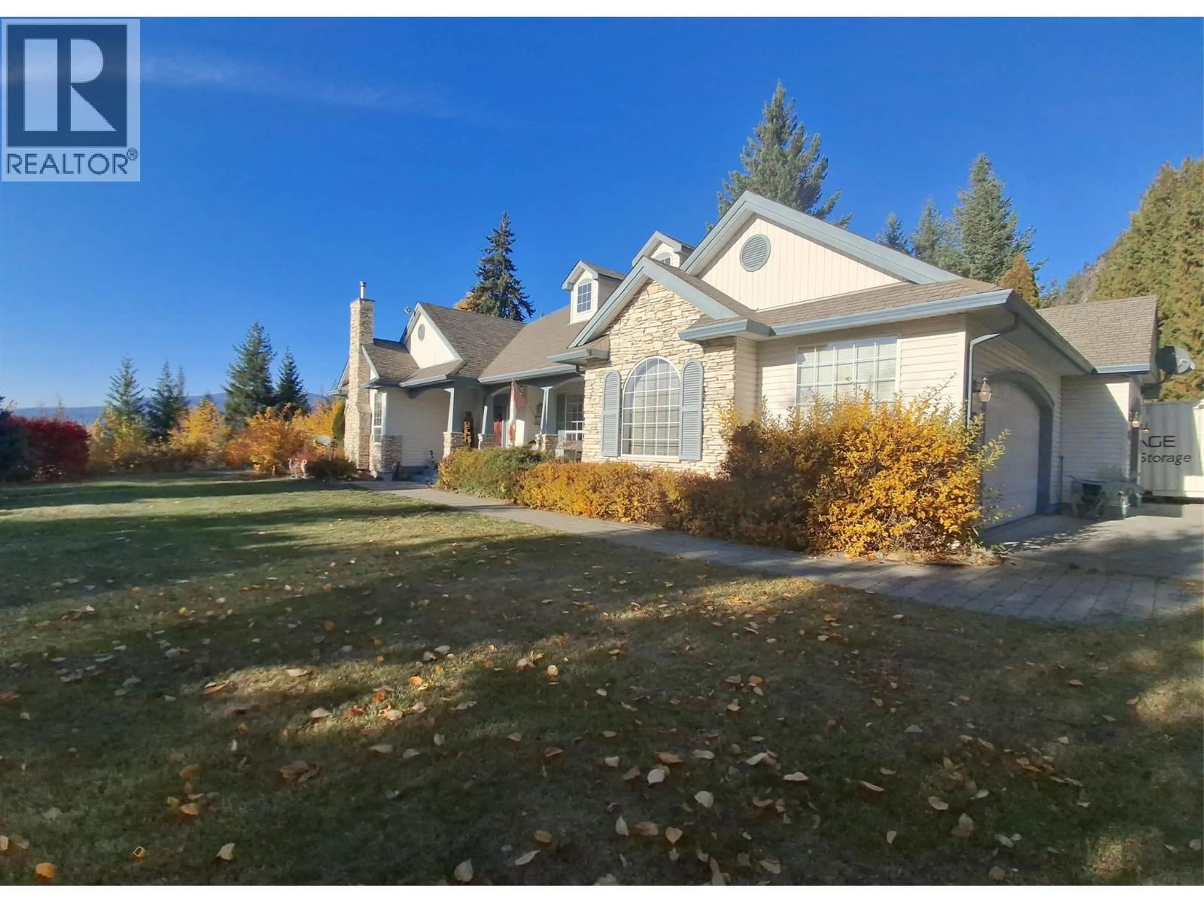 Home with vinyl exterior material, street for 3267 RONCASTLE ROAD, Blind Bay British Columbia V0E1H1