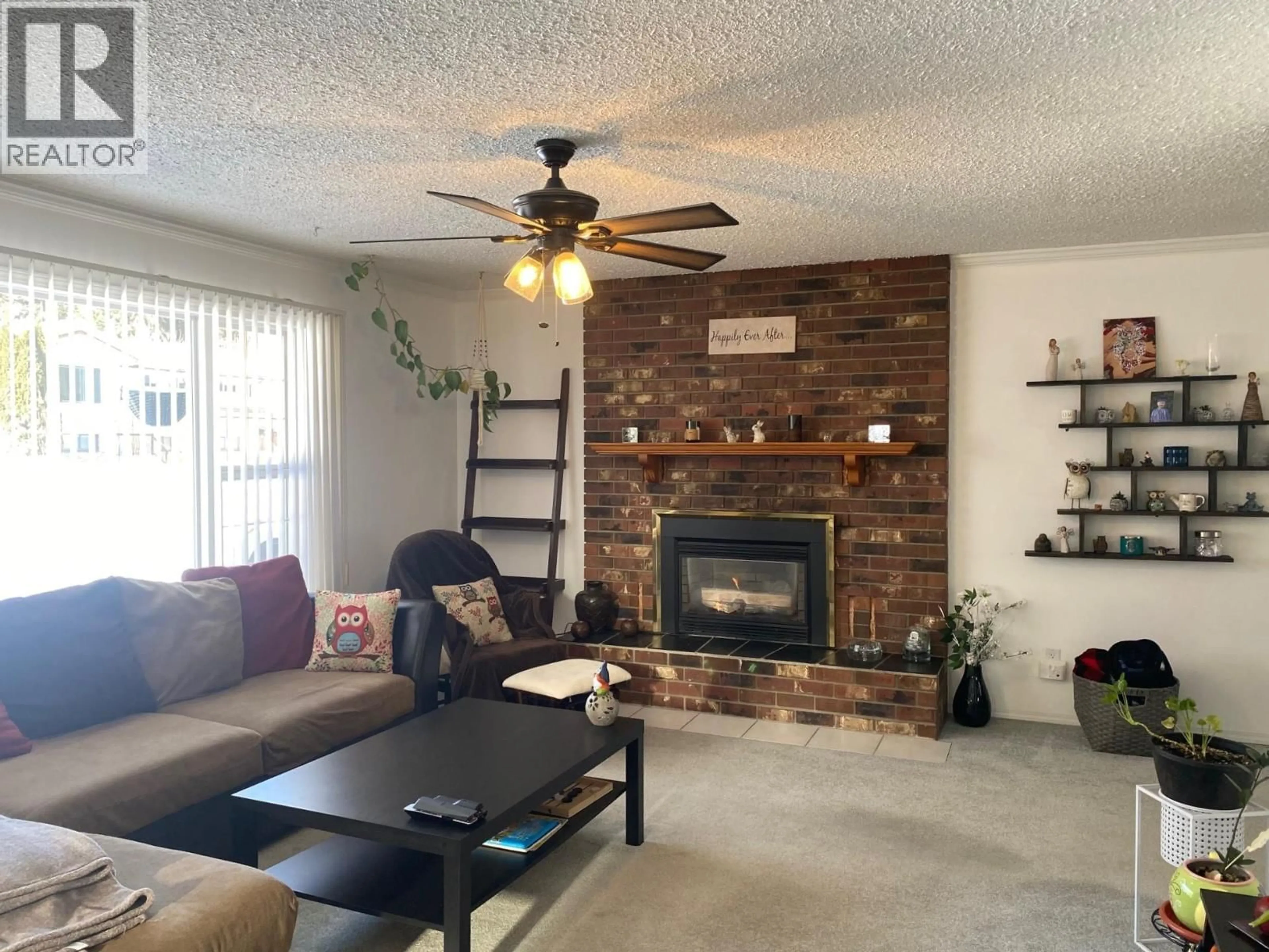 Living room with furniture, unknown for 1768 FIRST STREET, Fruitvale British Columbia V0G1L0