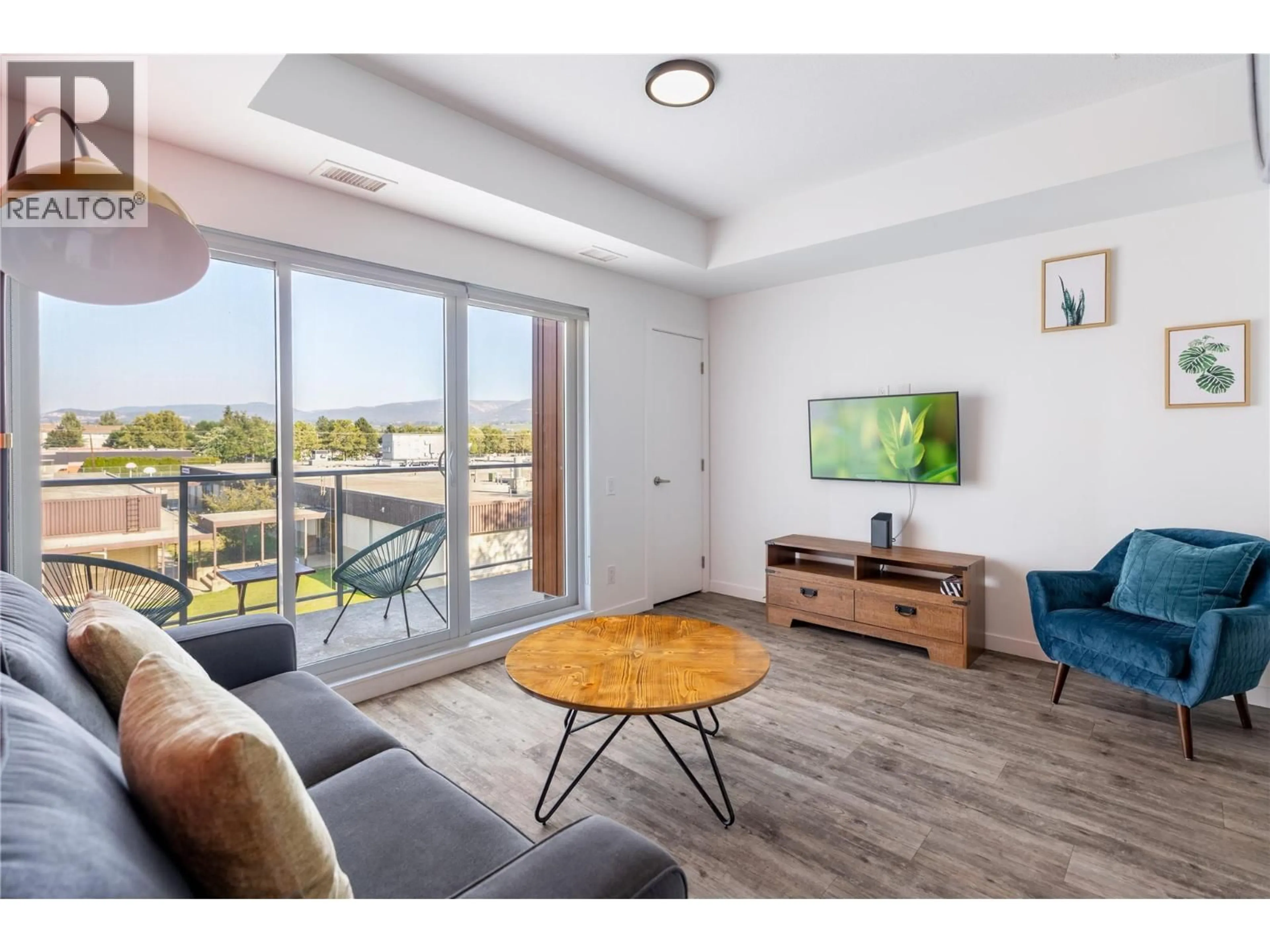 Living room with furniture, unknown for 309 - 1083 KLO ROAD, Kelowna British Columbia V1Y4X6