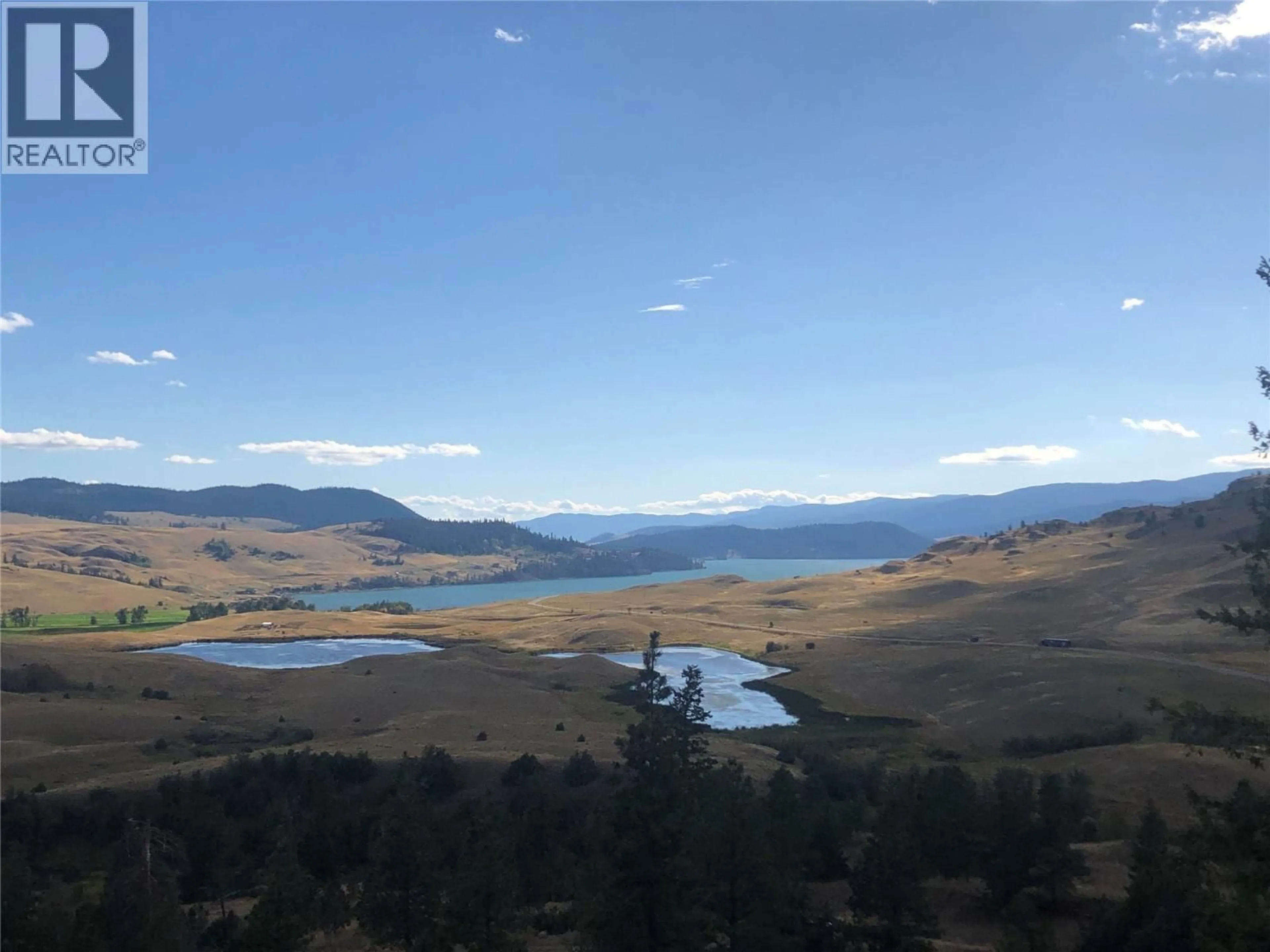 A pic from outside/outdoor area/front of a property/back of a property/a pic from drone, water/lake/river/ocean view for 7745 5A HIGHWAY, Kamloops British Columbia V0E2A0
