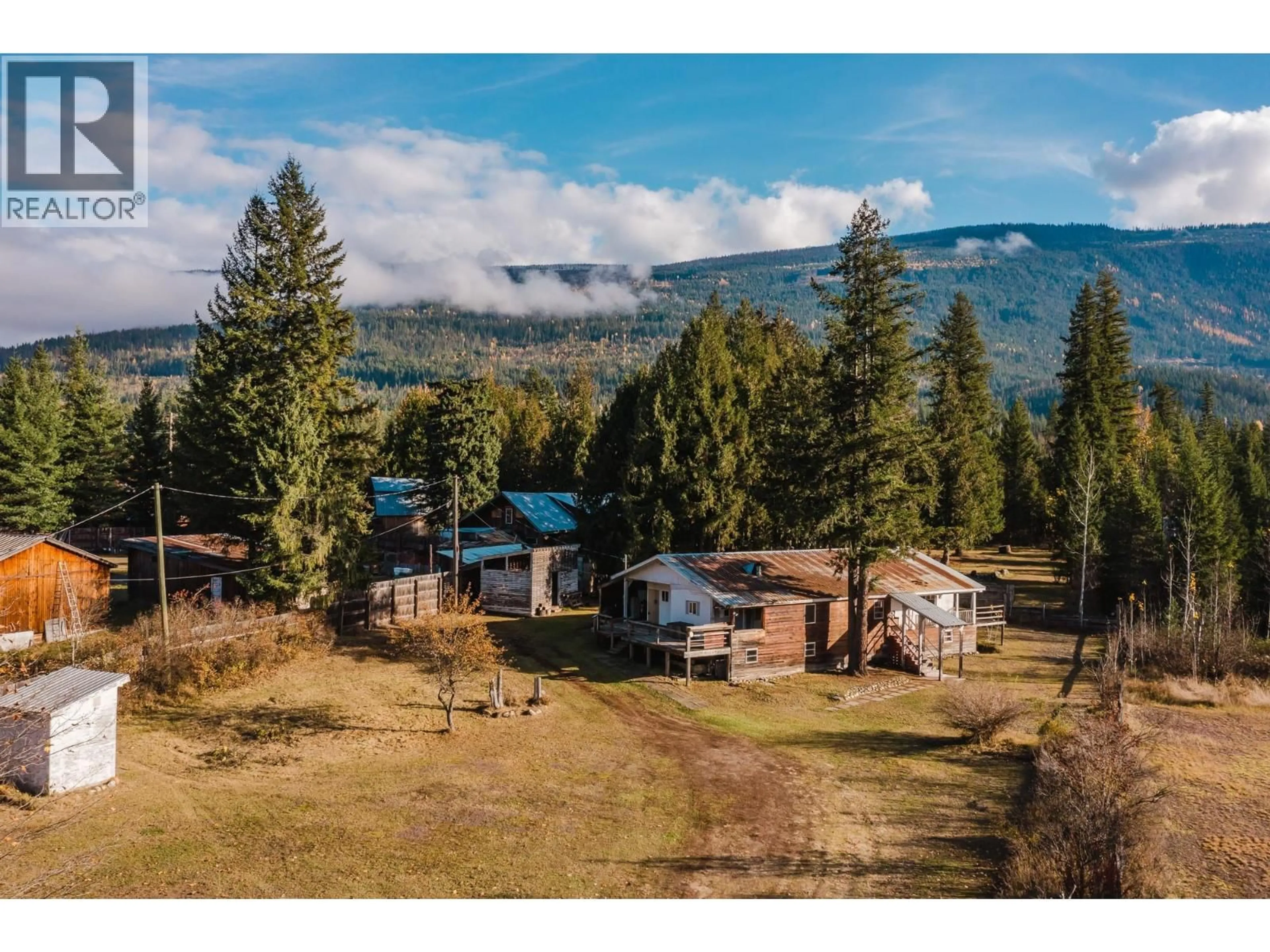 A pic from outside/outdoor area/front of a property/back of a property/a pic from drone, mountain view for 3974 MALAKWA STATION ROAD, Malakwa British Columbia V0E2J0