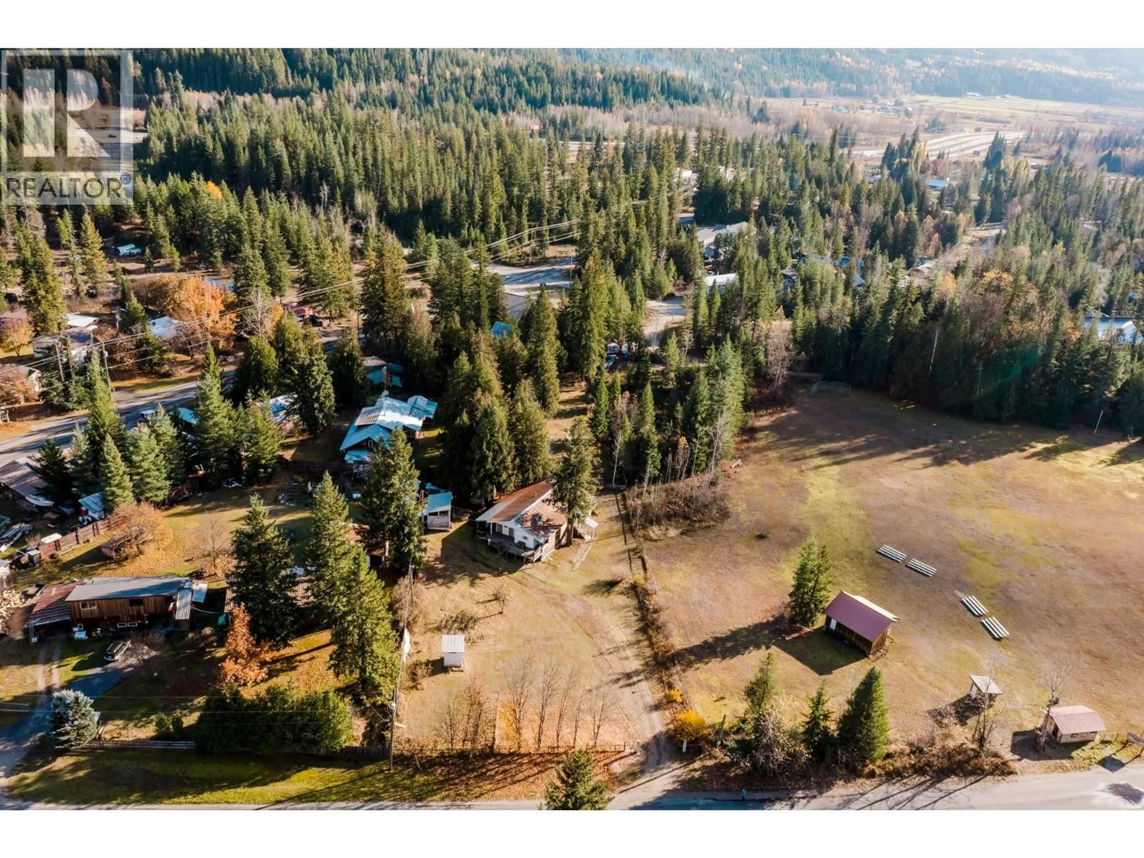 A pic from outside/outdoor area/front of a property/back of a property/a pic from drone, forest/trees view for 3974 MALAKWA STATION ROAD, Malakwa British Columbia V0E2J0
