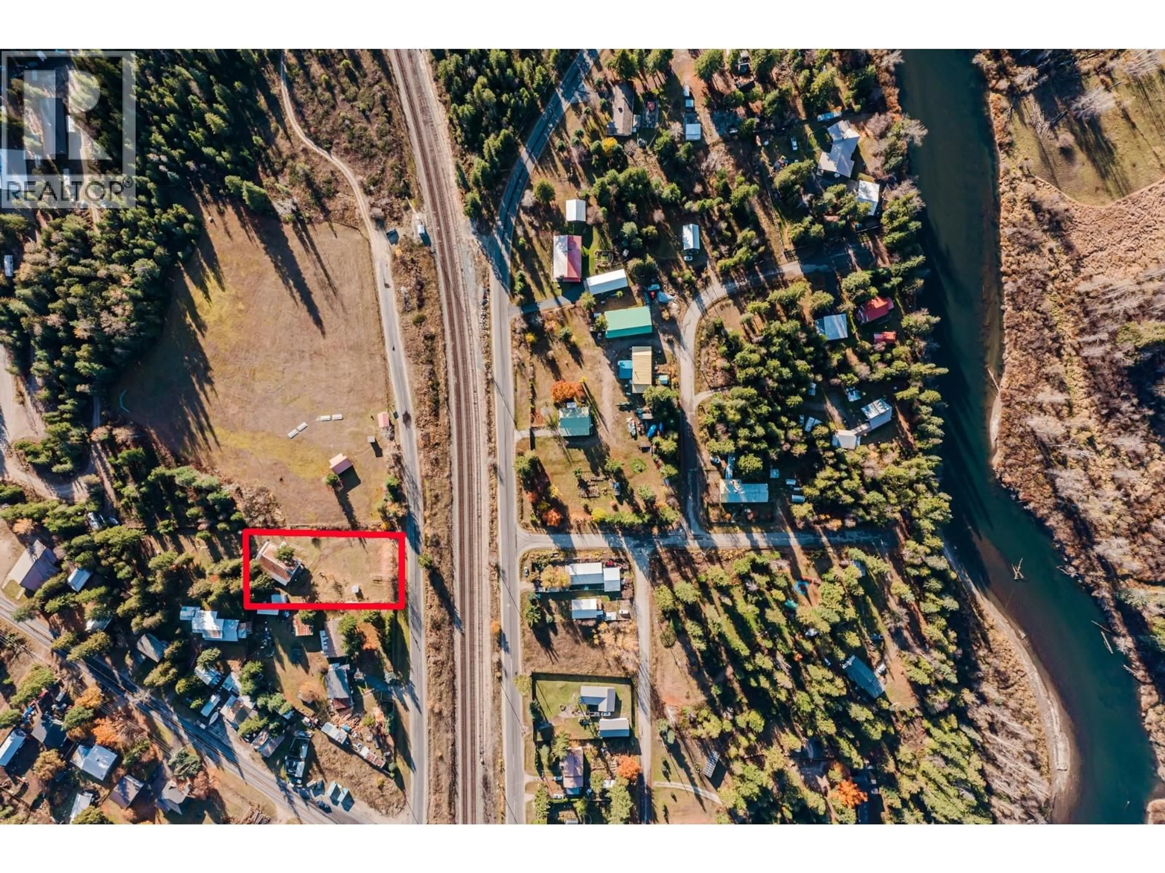 A pic from outside/outdoor area/front of a property/back of a property/a pic from drone, water/lake/river/ocean view for 3974 MALAKWA STATION ROAD, Malakwa British Columbia V0E2J0