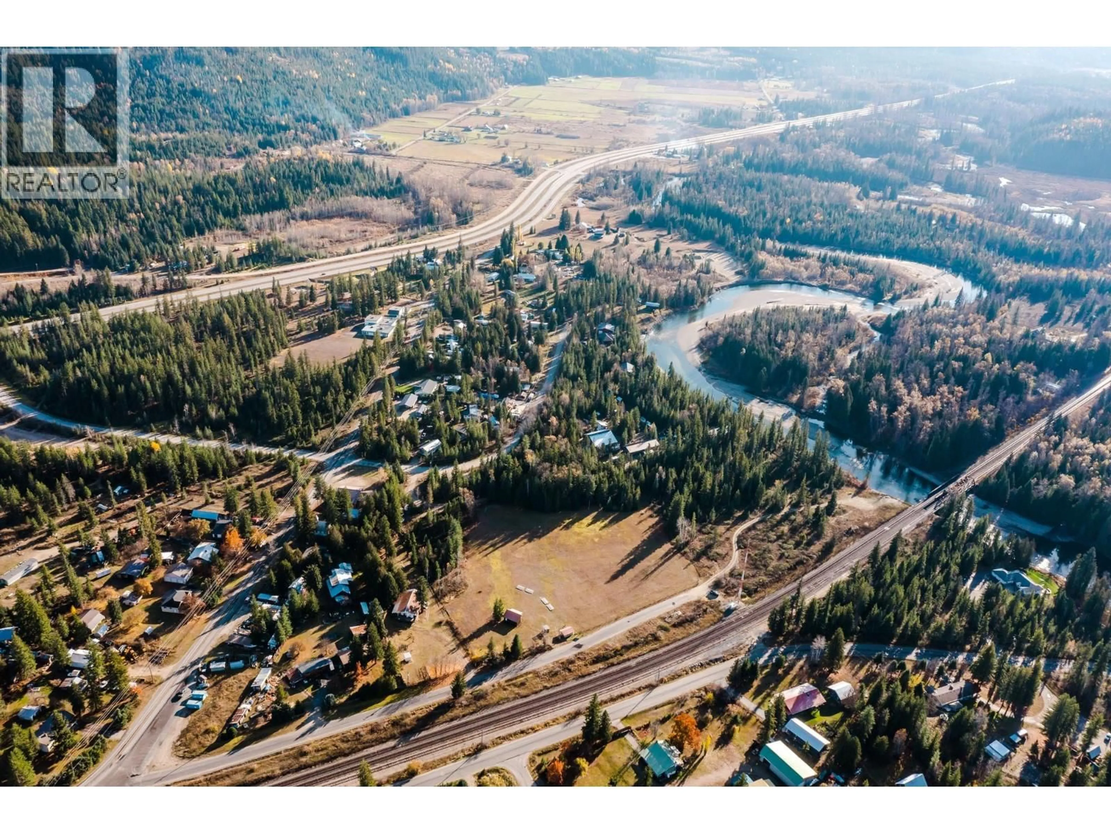 A pic from outside/outdoor area/front of a property/back of a property/a pic from drone, mountain view for 3974 MALAKWA STATION ROAD, Malakwa British Columbia V0E2J0