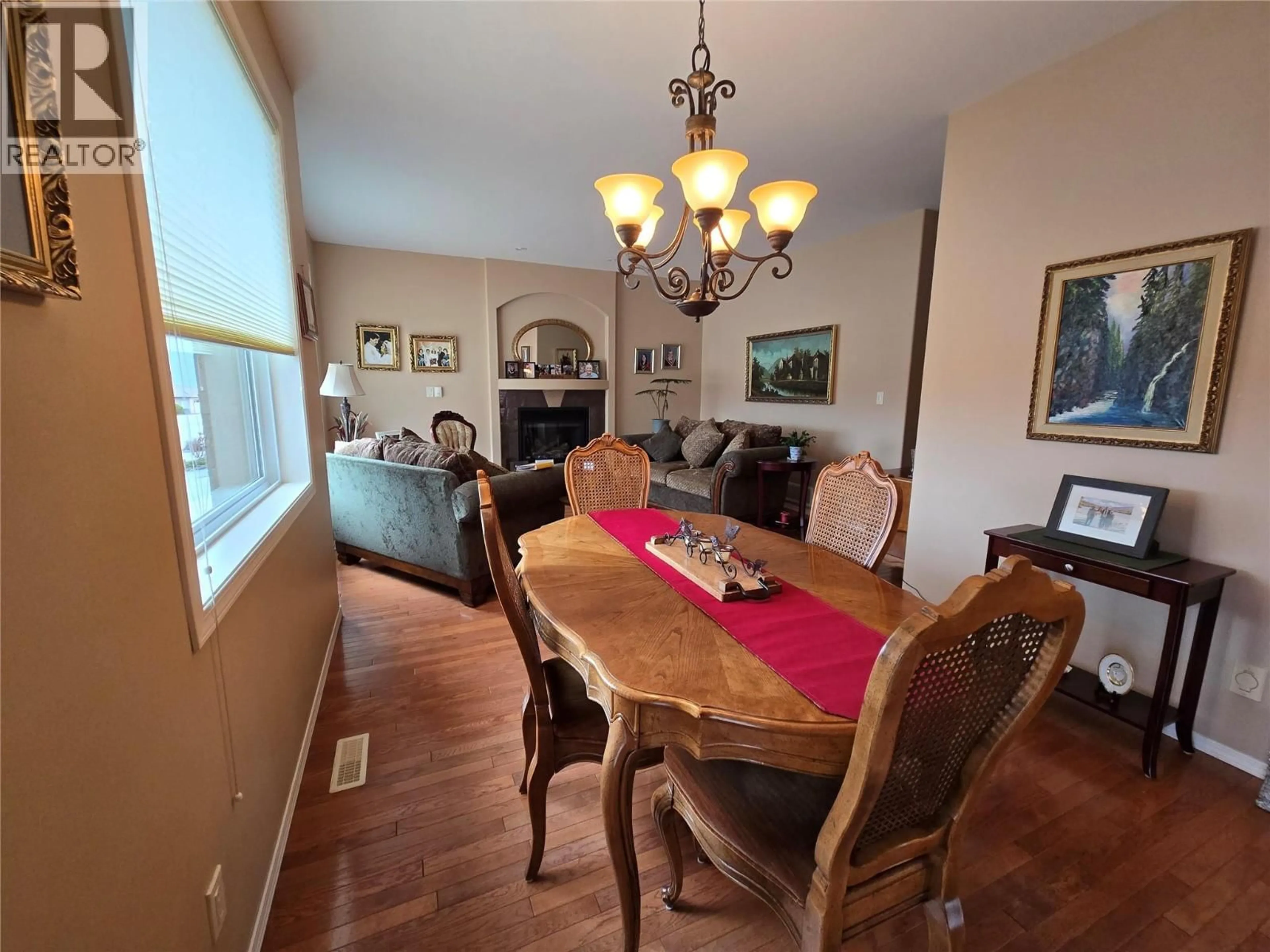 Dining room, wood/laminate floor for 11908 LA COSTA LANE, Osoyoos British Columbia V0H1V4