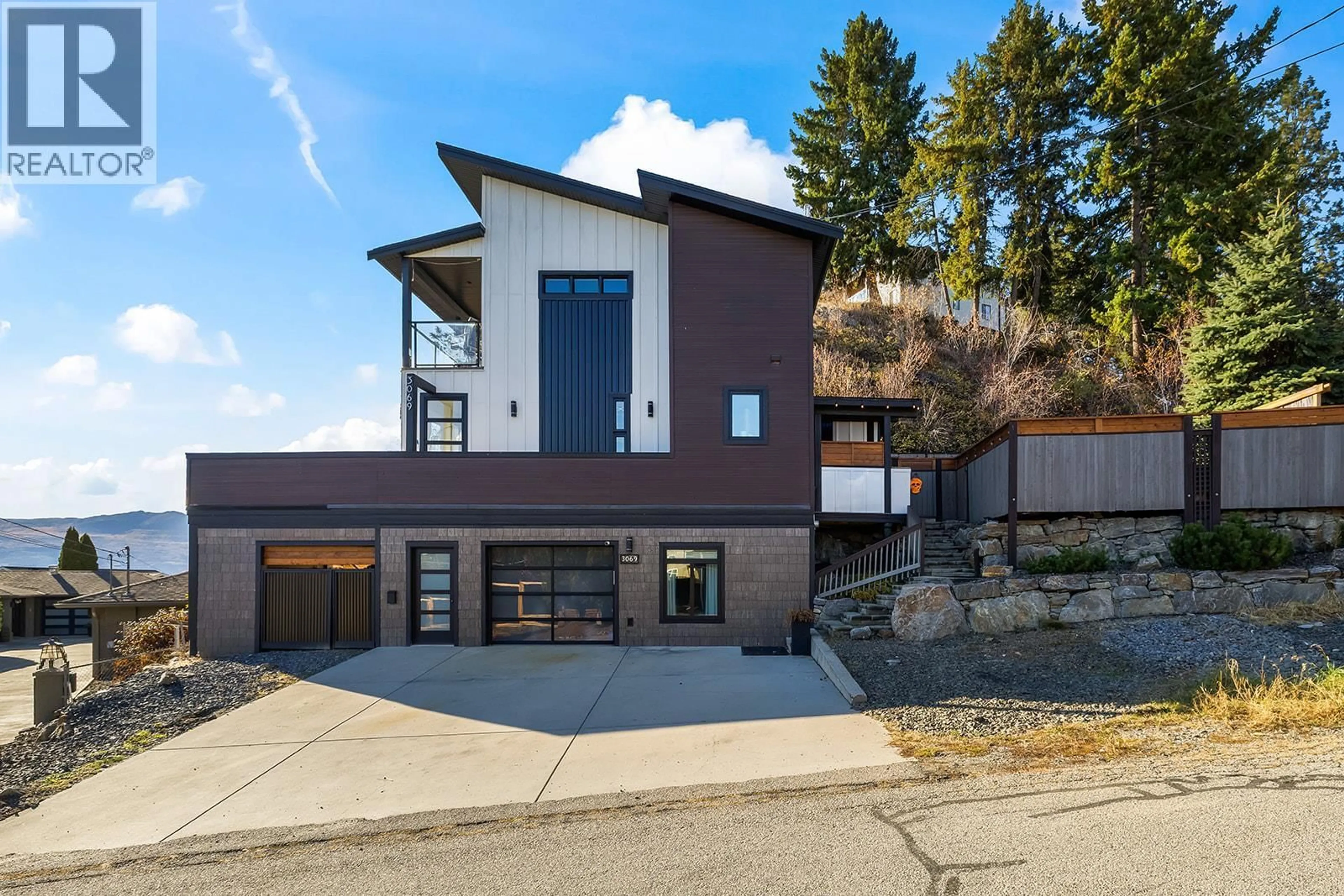 Home with brick exterior material, mountain view for 3069 OURTOLAND ROAD, West Kelowna British Columbia V1Z2J3