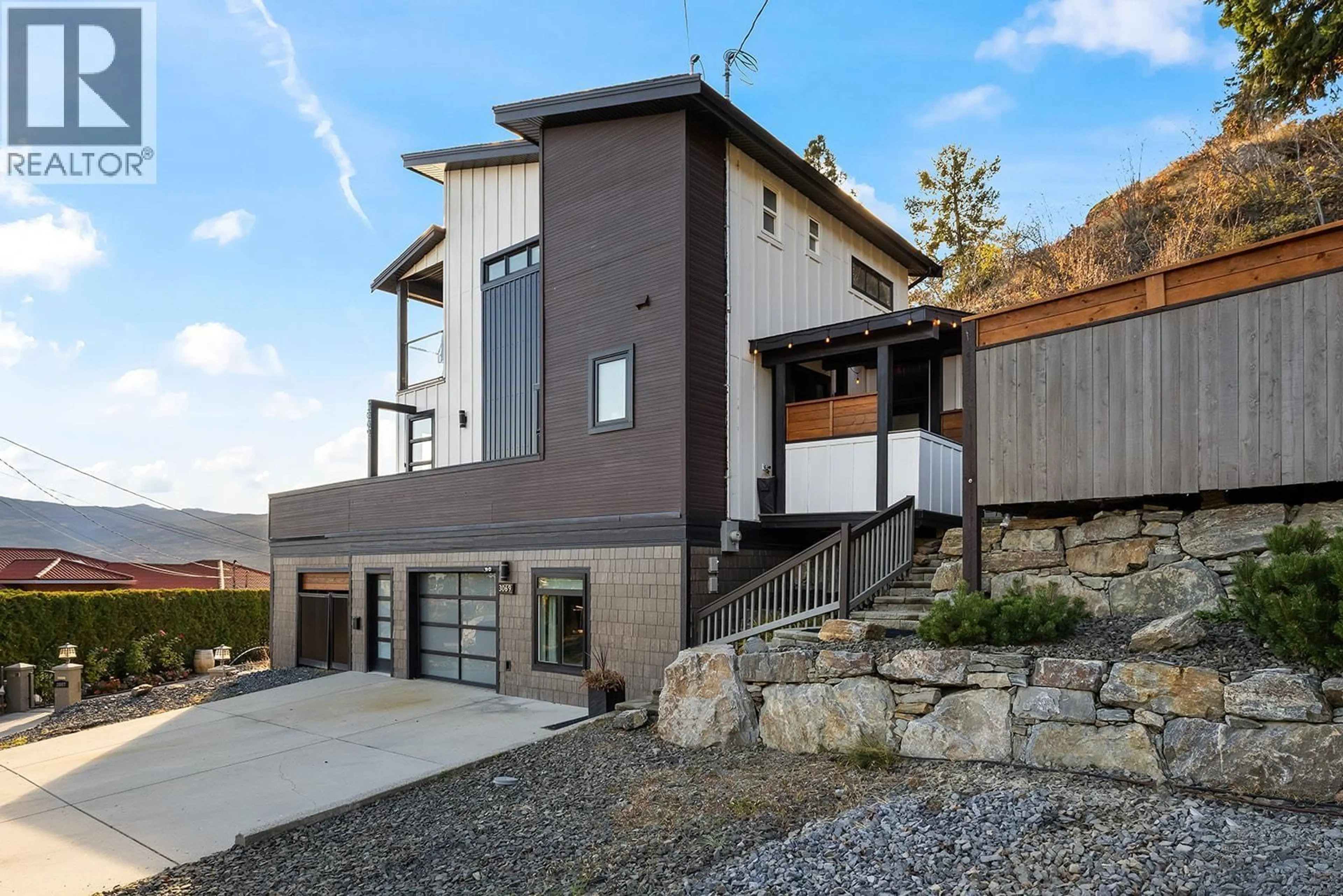 Home with brick exterior material, mountain view for 3069 OURTOLAND ROAD, West Kelowna British Columbia V1Z2J3