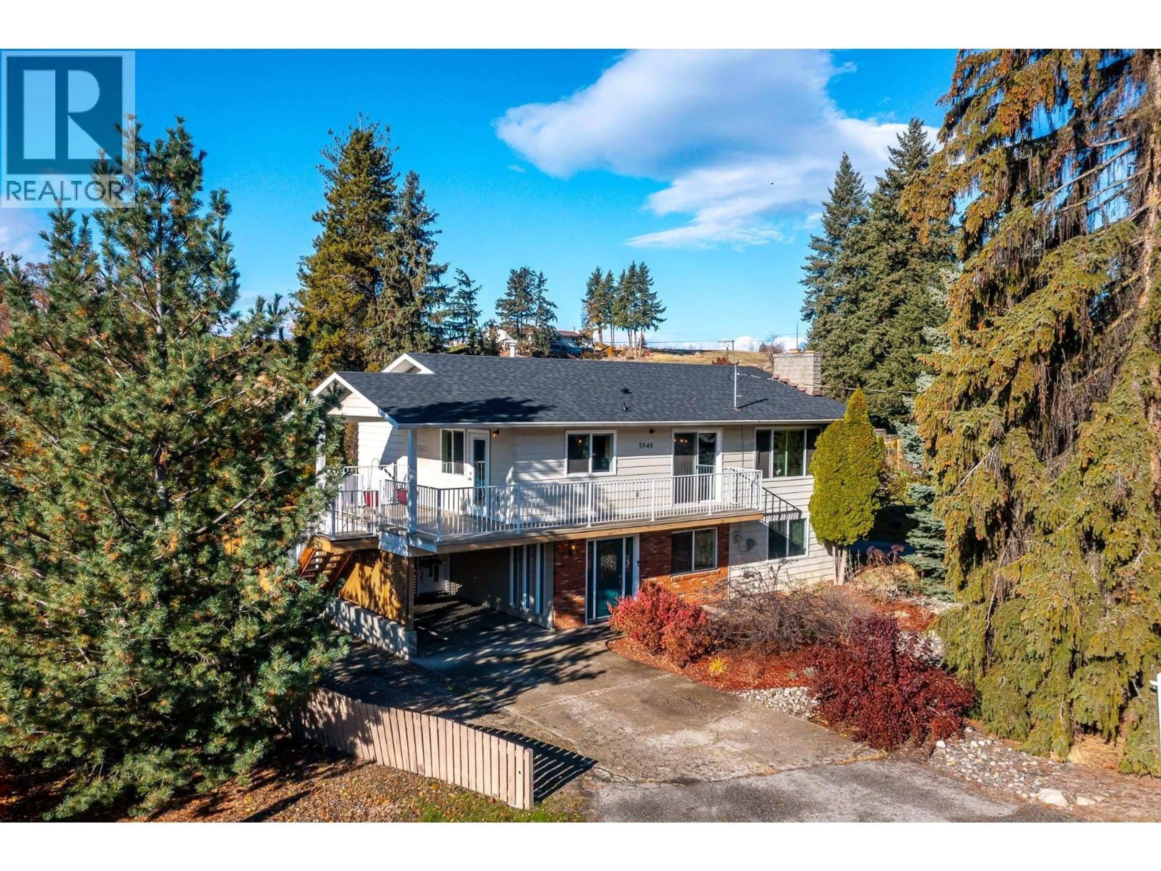 A pic from outside/outdoor area/front of a property/back of a property/a pic from drone, street for 5940 STAR ROAD, Vernon British Columbia V1T8L6