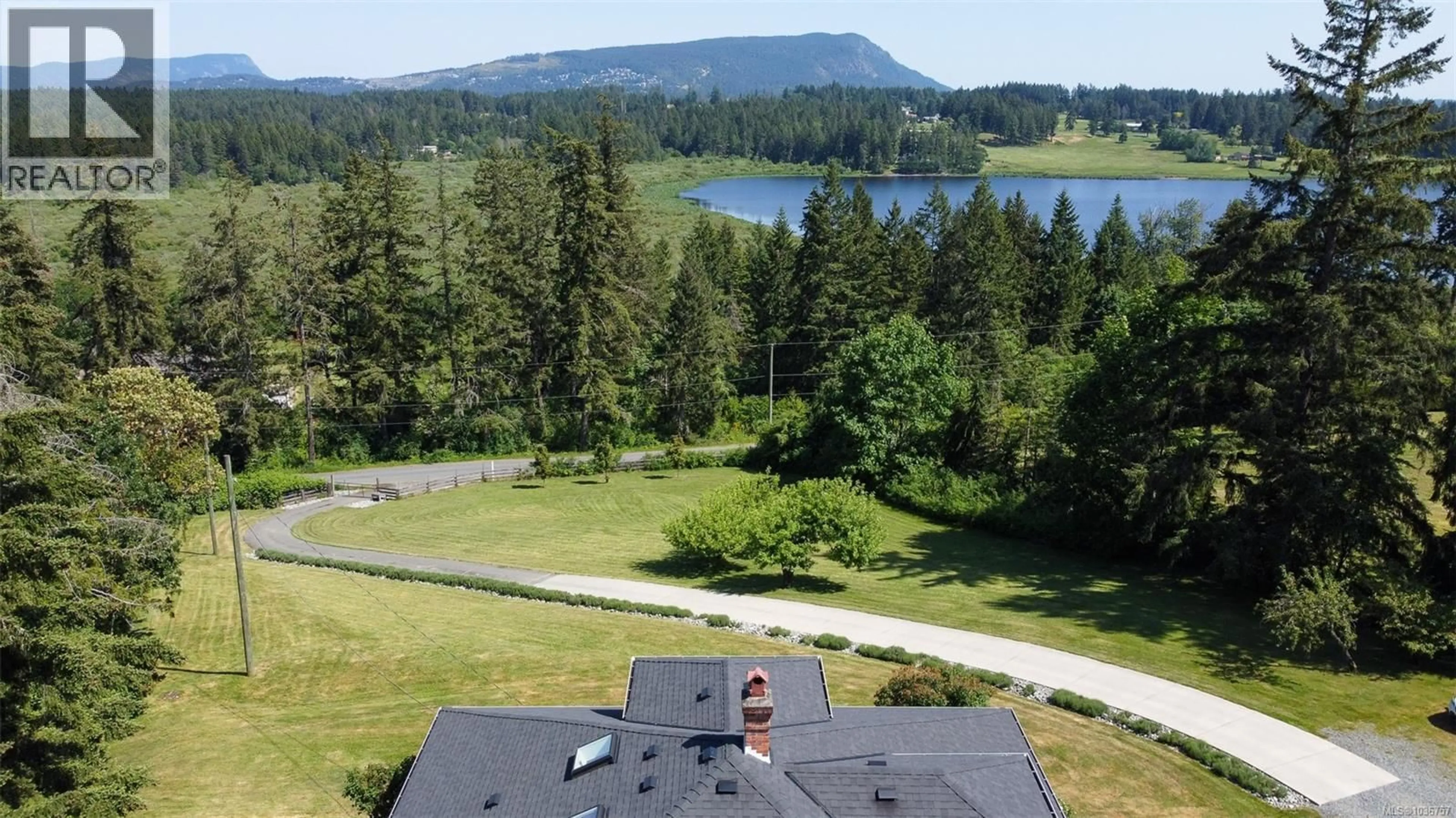 A pic from outside/outdoor area/front of a property/back of a property/a pic from drone, water/lake/river/ocean view for 6742 NORCROSS ROAD, Duncan British Columbia V9L6C3