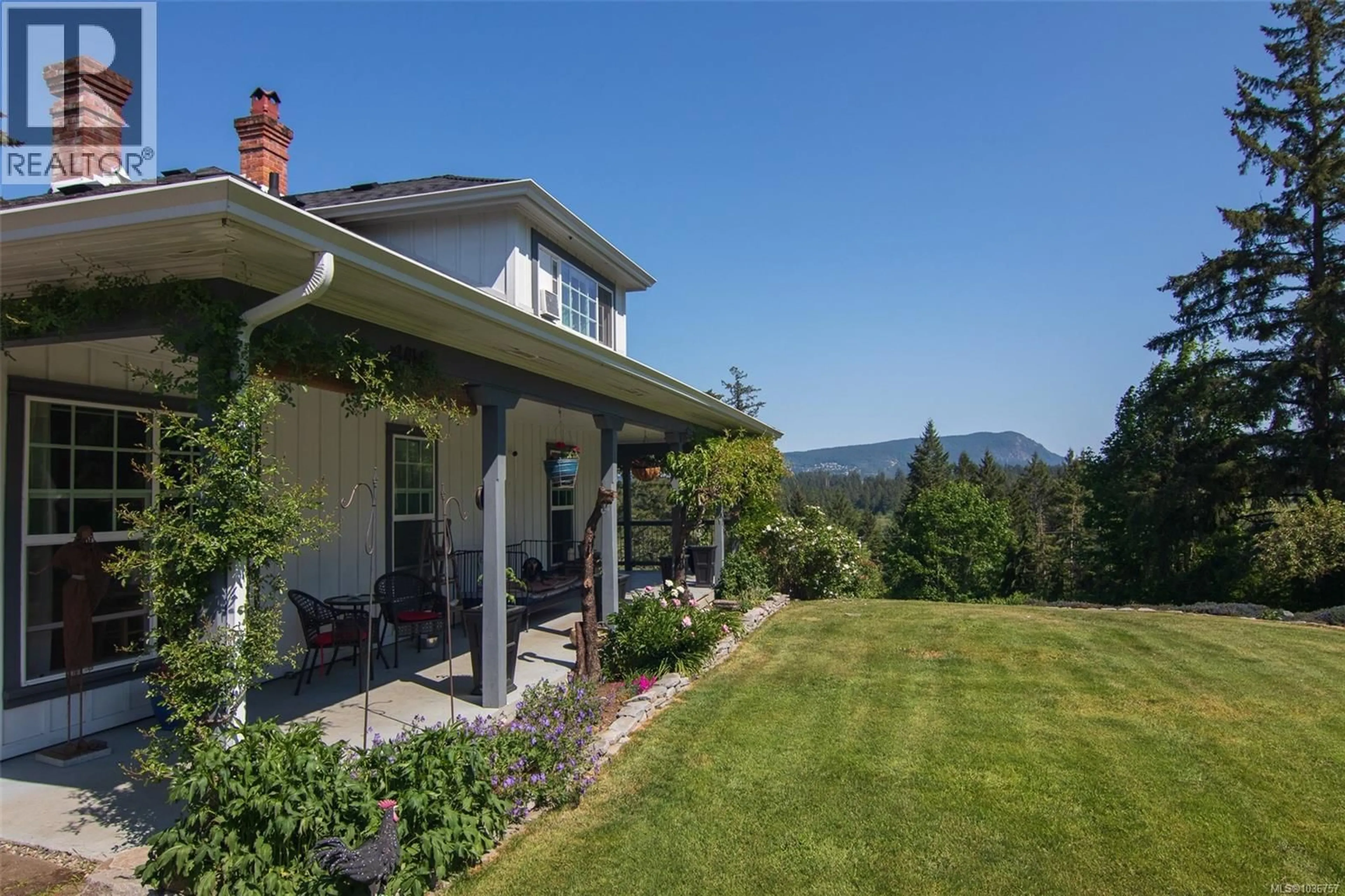 A pic from outside/outdoor area/front of a property/back of a property/a pic from drone, mountain view for 6742 NORCROSS ROAD, Duncan British Columbia V9L6C3