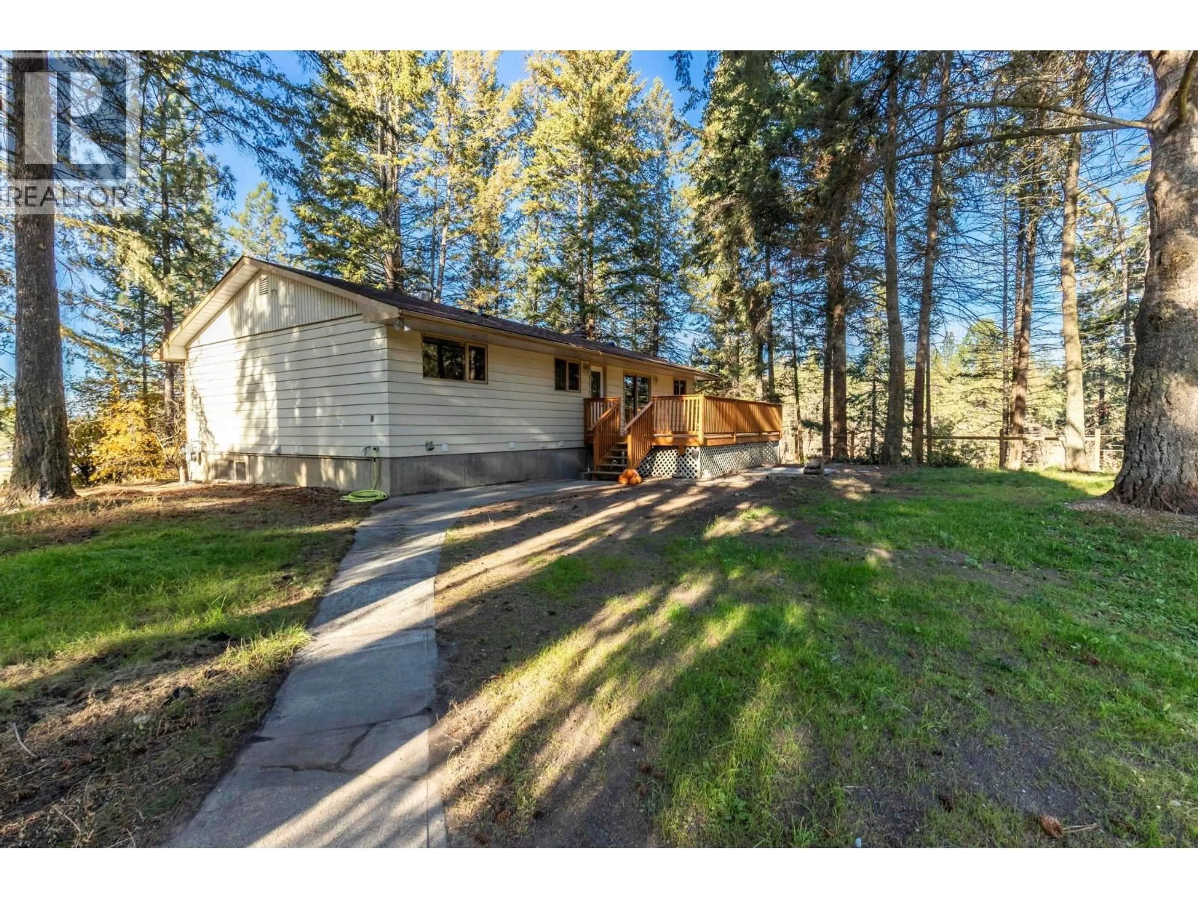 A pic from outside/outdoor area/front of a property/back of a property/a pic from drone, unknown for 4019 MILLER ROAD, Kelowna British Columbia V1W4C7