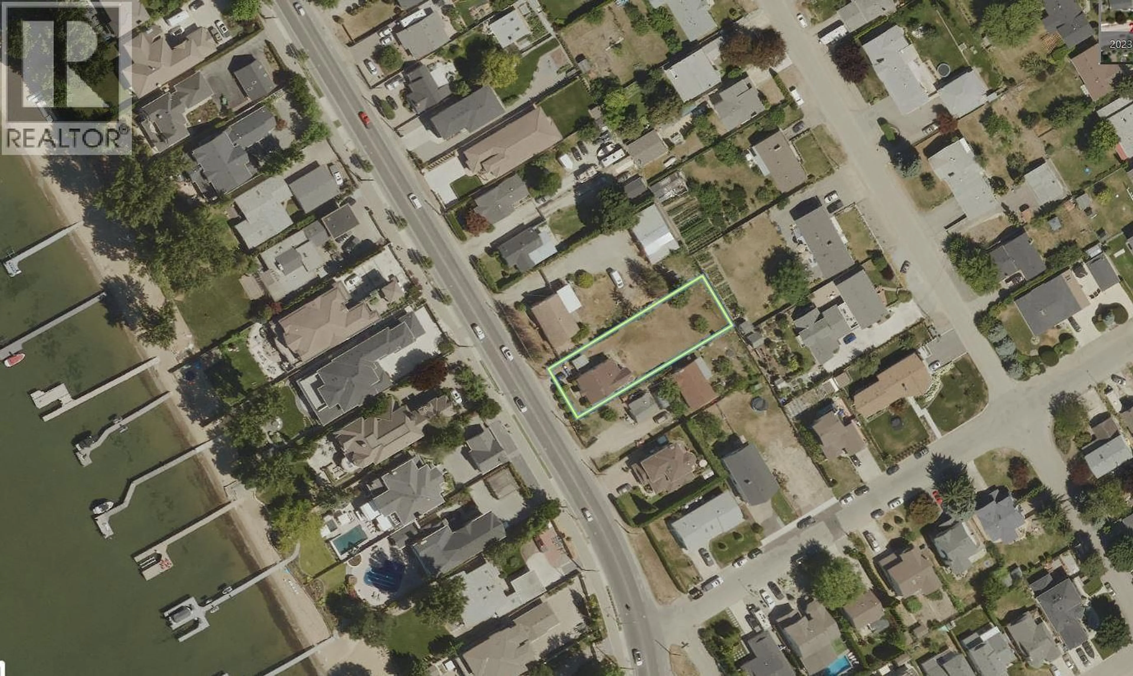 A pic from outside/outdoor area/front of a property/back of a property/a pic from drone, street for 3595 LAKESHORE ROAD, Kelowna British Columbia V1W3K1