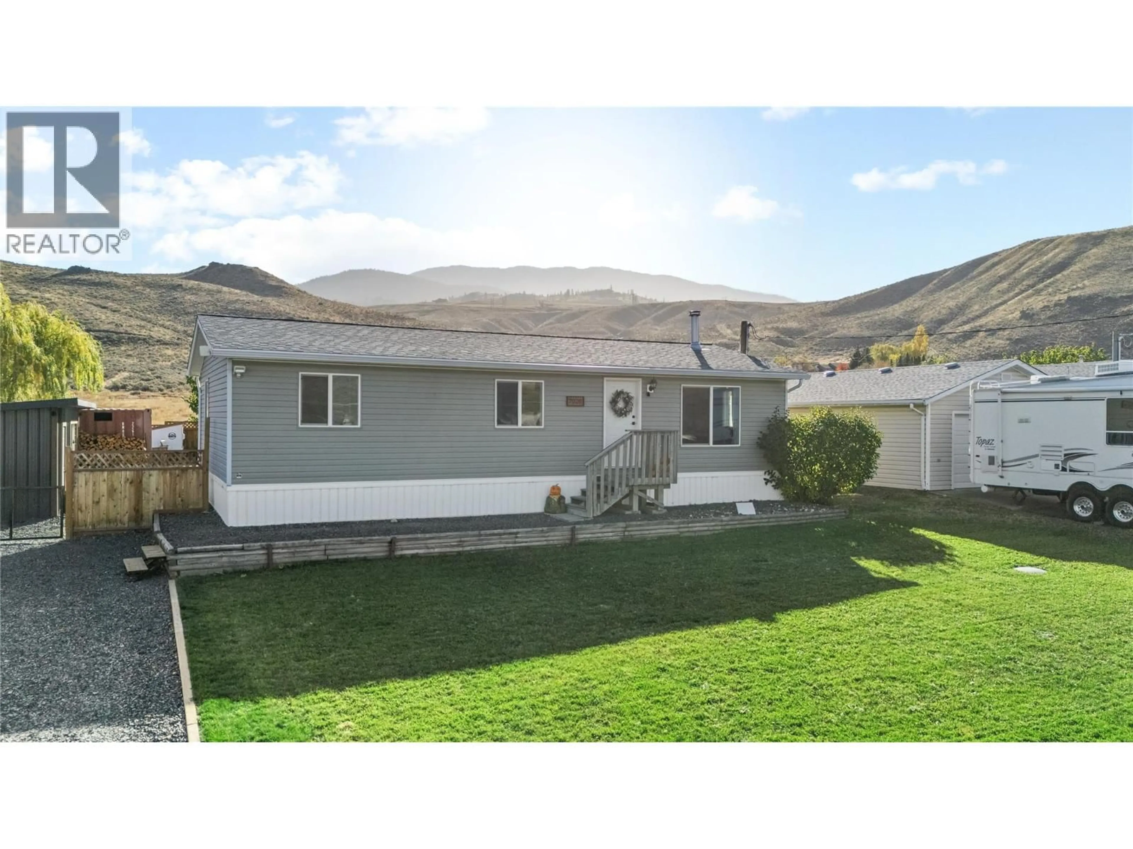 Home with vinyl exterior material, mountain view for 7020 WATSON DRIVE EAST, Kamloops British Columbia V0K2J0