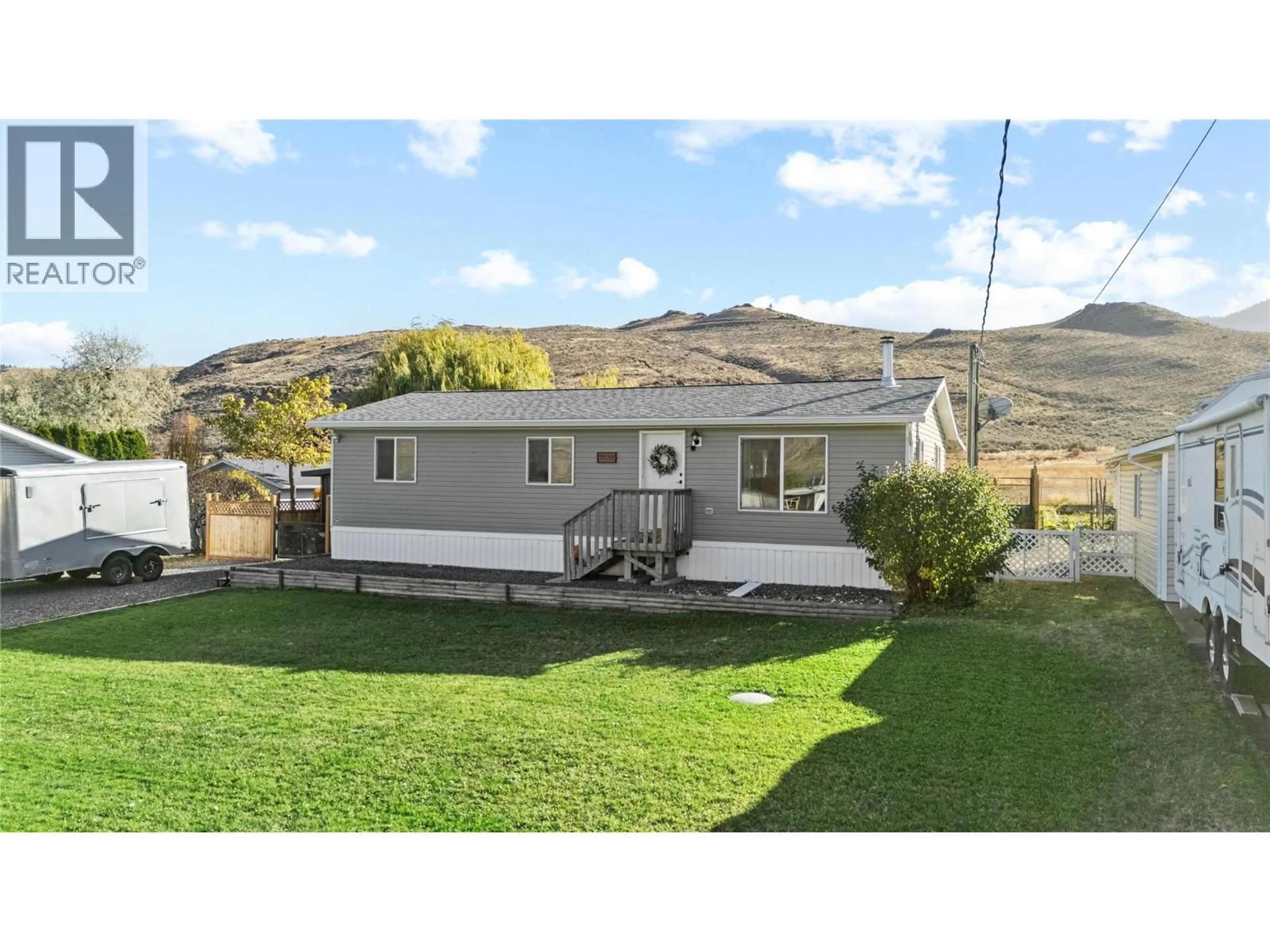 Home with vinyl exterior material, mountain view for 7020 WATSON DRIVE EAST, Kamloops British Columbia V0K2J0