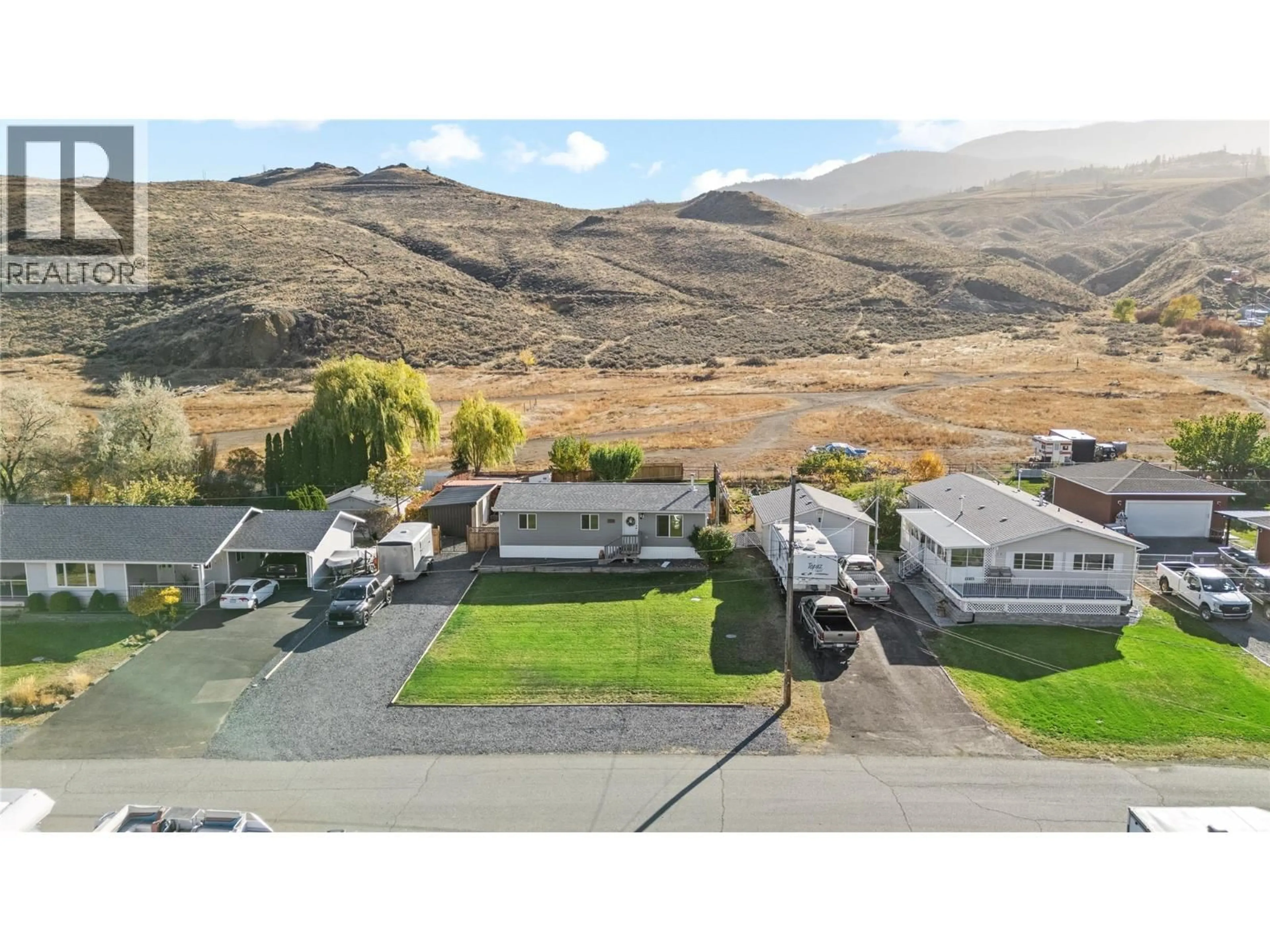 A pic from outside/outdoor area/front of a property/back of a property/a pic from drone, mountain view for 7020 WATSON DRIVE EAST, Kamloops British Columbia V0K2J0