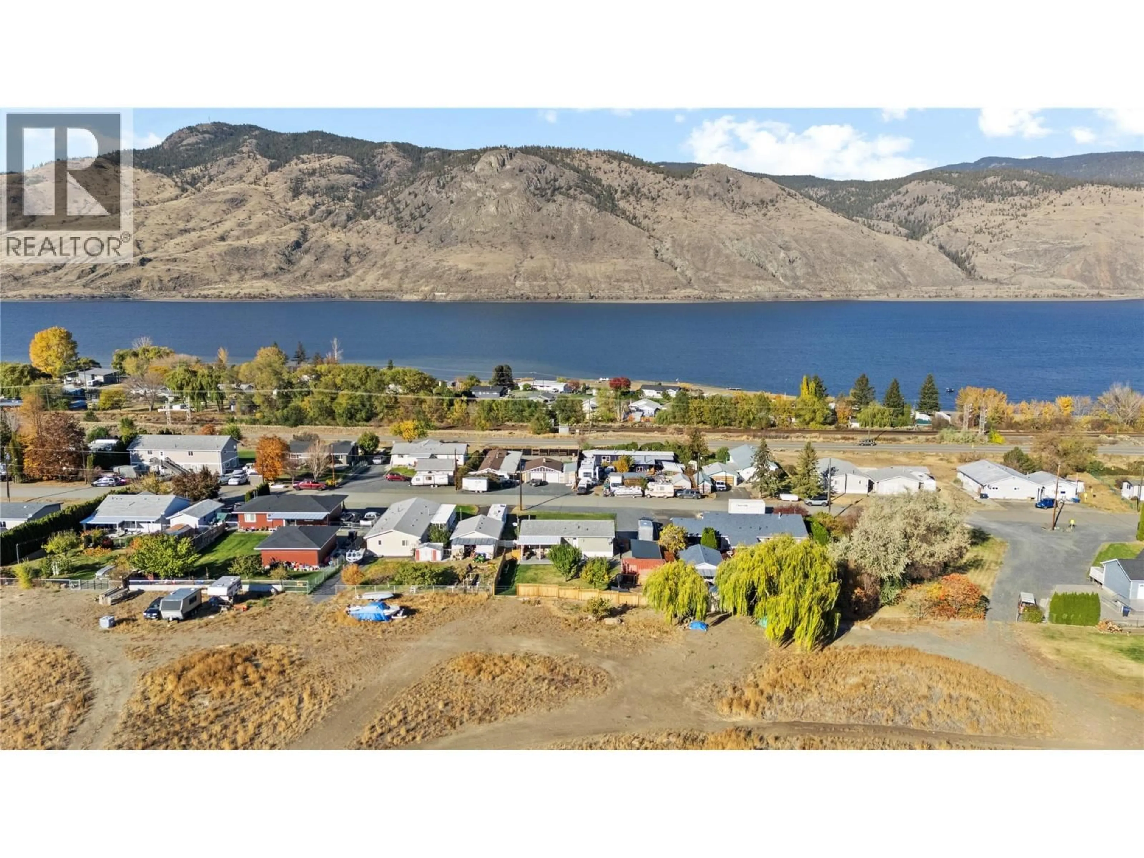 A pic from outside/outdoor area/front of a property/back of a property/a pic from drone, water/lake/river/ocean view for 7020 WATSON DRIVE EAST, Kamloops British Columbia V0K2J0