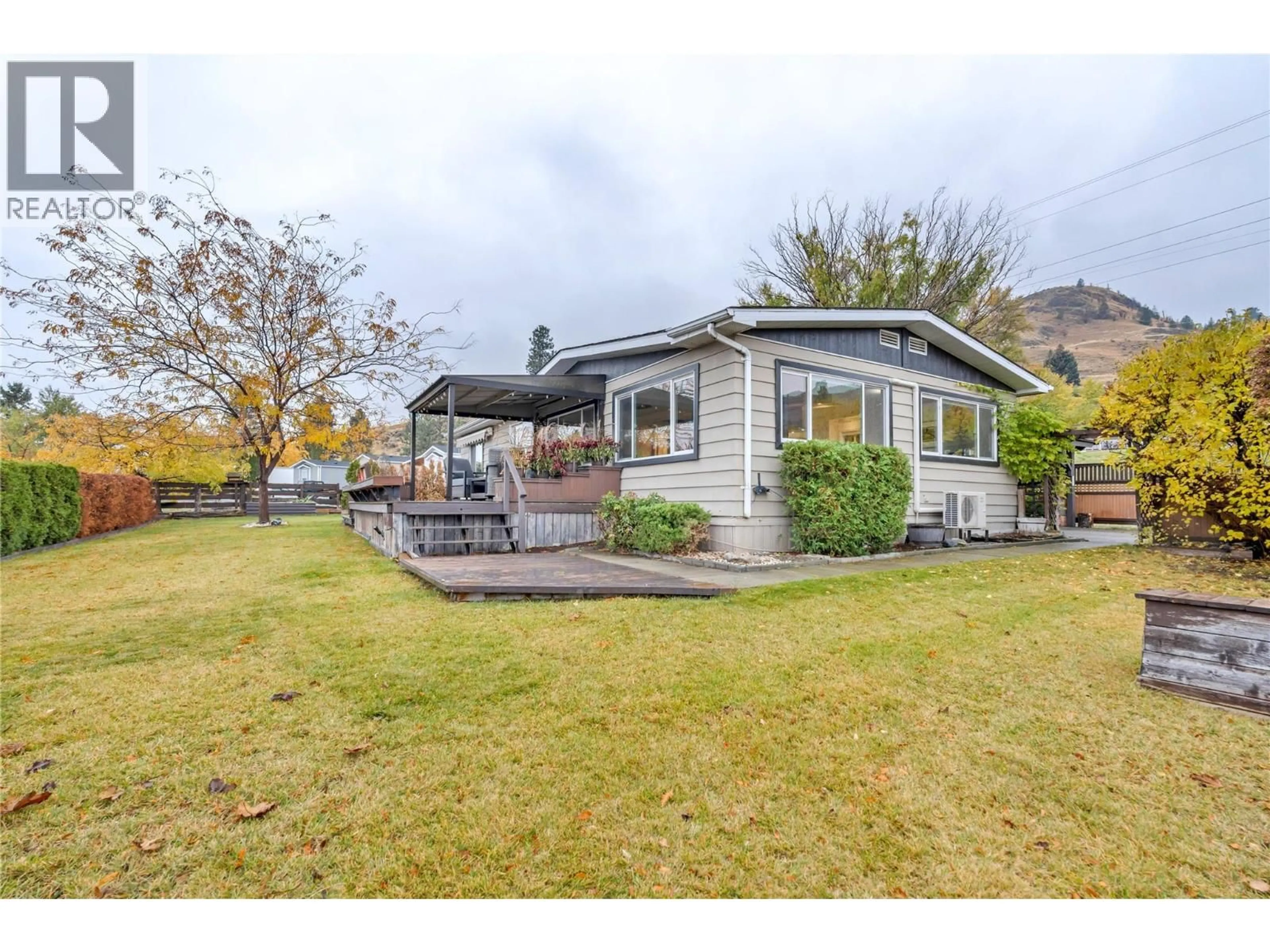 A pic from outside/outdoor area/front of a property/back of a property/a pic from drone, unknown for 24 - 201 HIGHWAY 97 HIGHWAY, Penticton British Columbia V2A0E4