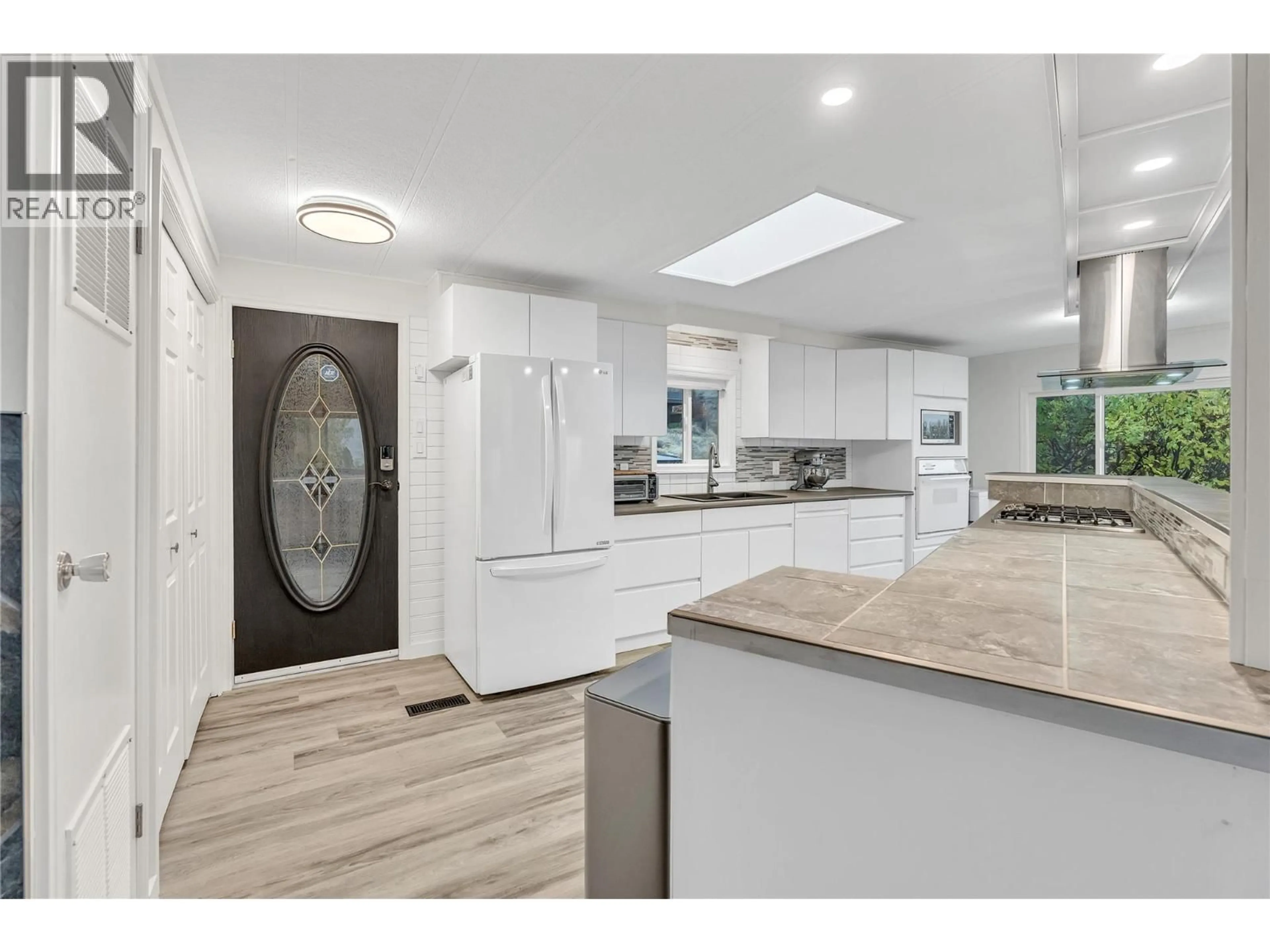 Open concept kitchen, ceramic/tile floor for 24 - 201 HIGHWAY 97 HIGHWAY, Penticton British Columbia V2A0E4