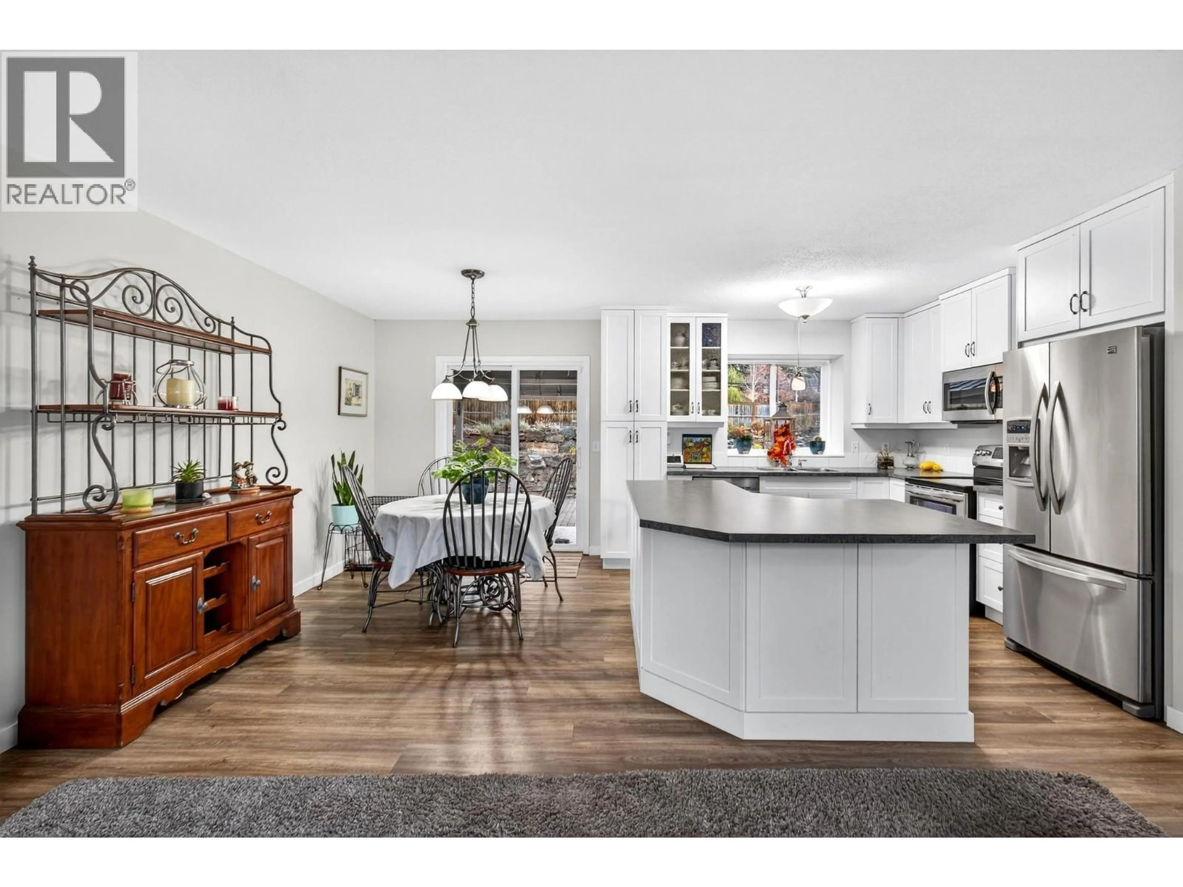 Open concept kitchen, wood/laminate floor for 3484 PARKLANE ROAD, West Kelowna British Columbia V4T1B8