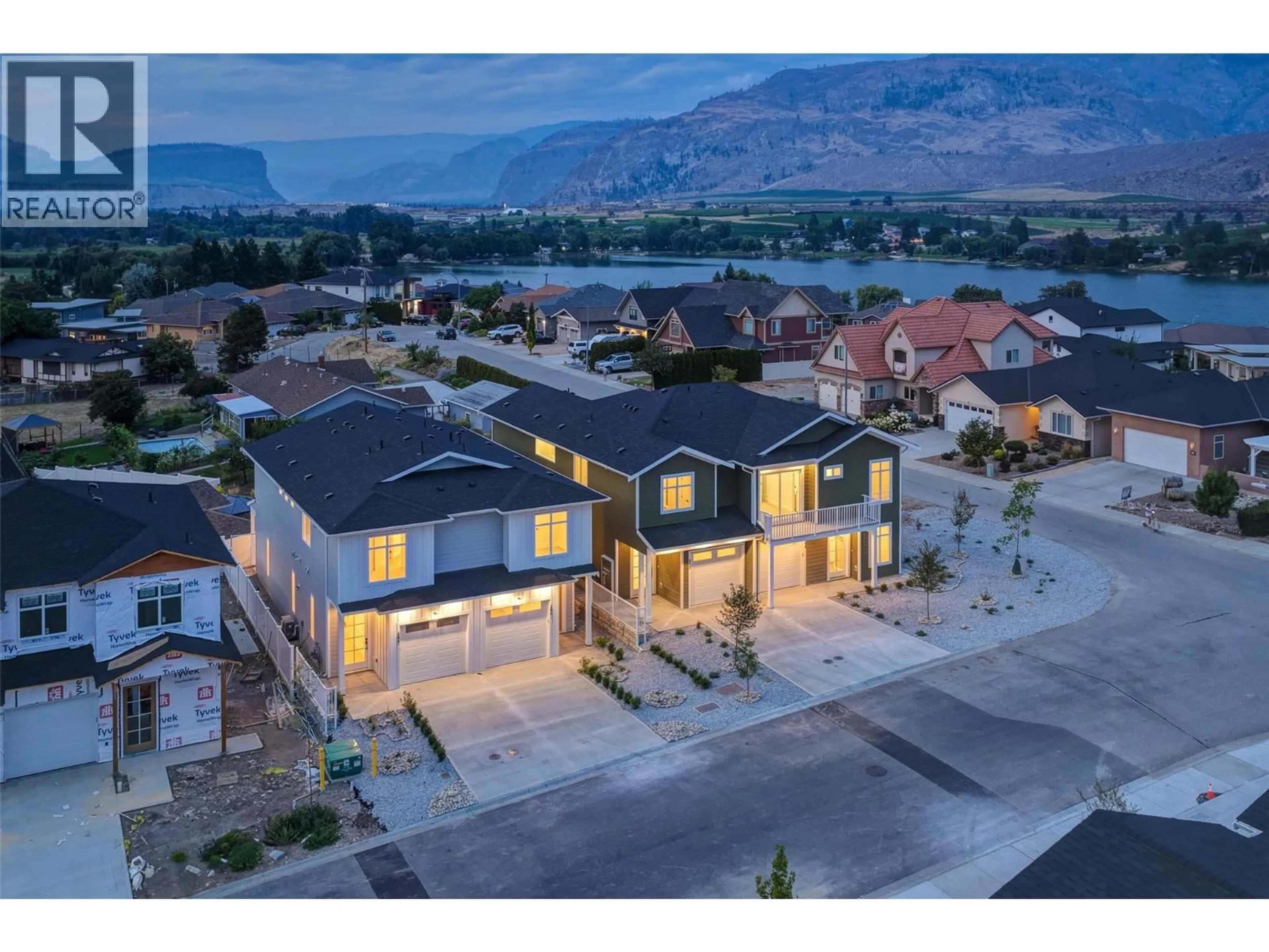 A pic from outside/outdoor area/front of a property/back of a property/a pic from drone, mountain view for 384 CHARDONNAY AVENUE, Oliver British Columbia V0H1T4