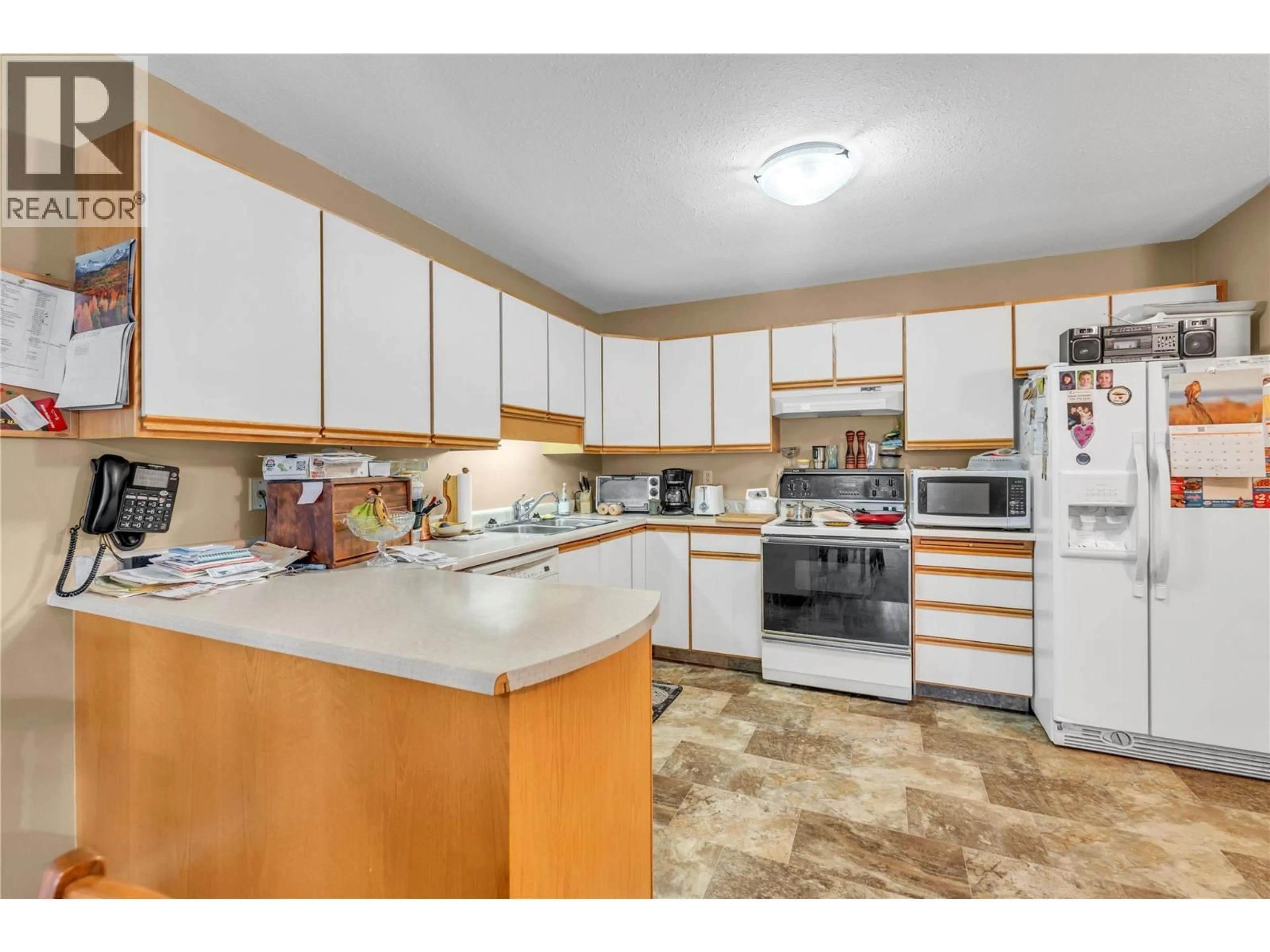 Standard kitchen, unknown for 201-262 KINNEY AVENUE, Penticton British Columbia V2A6R6