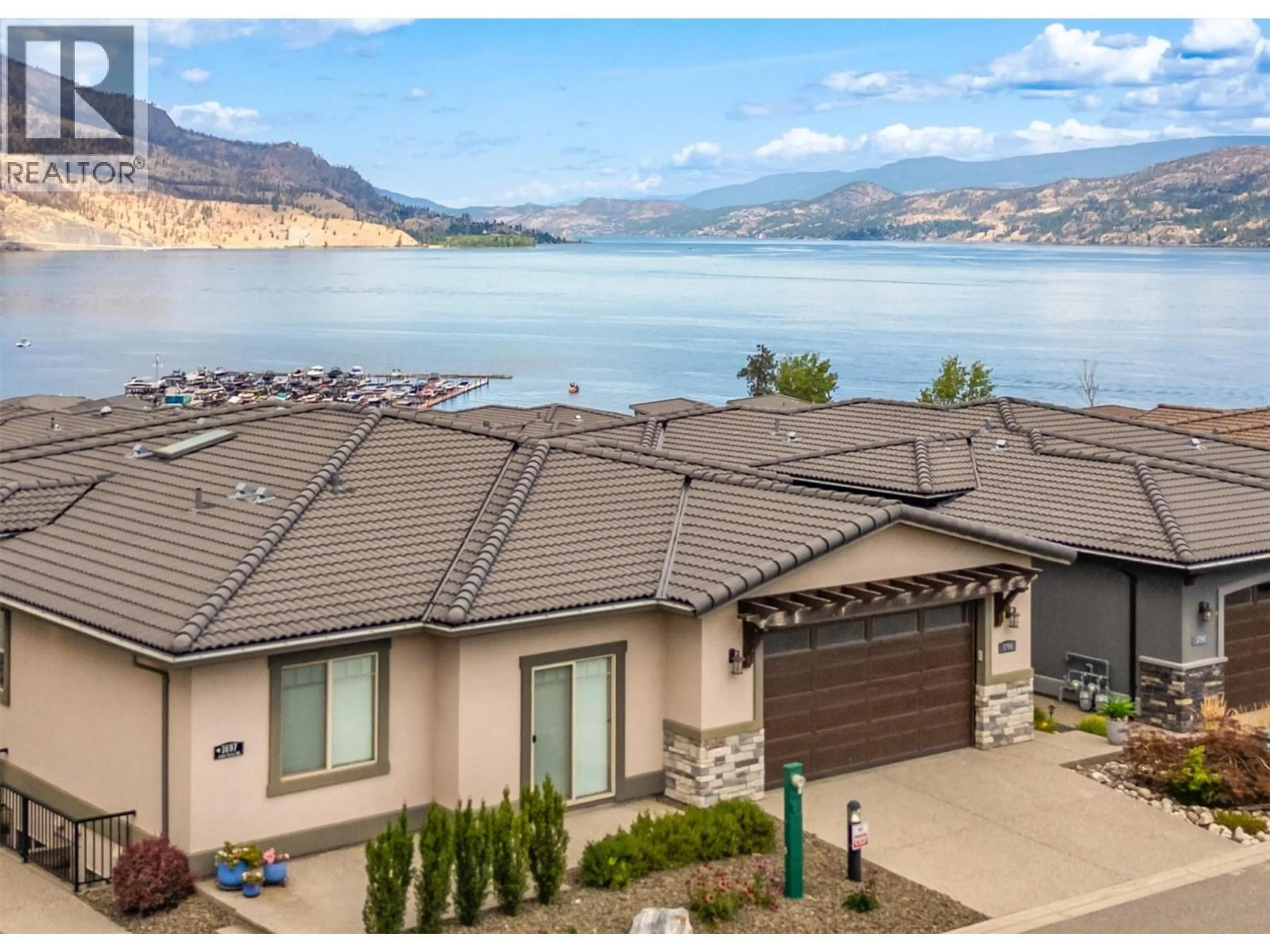 A pic from outside/outdoor area/front of a property/back of a property/a pic from drone, water/lake/river/ocean view for 1796 VIEWPOINT DRIVE, Kelowna British Columbia V1Z4E1