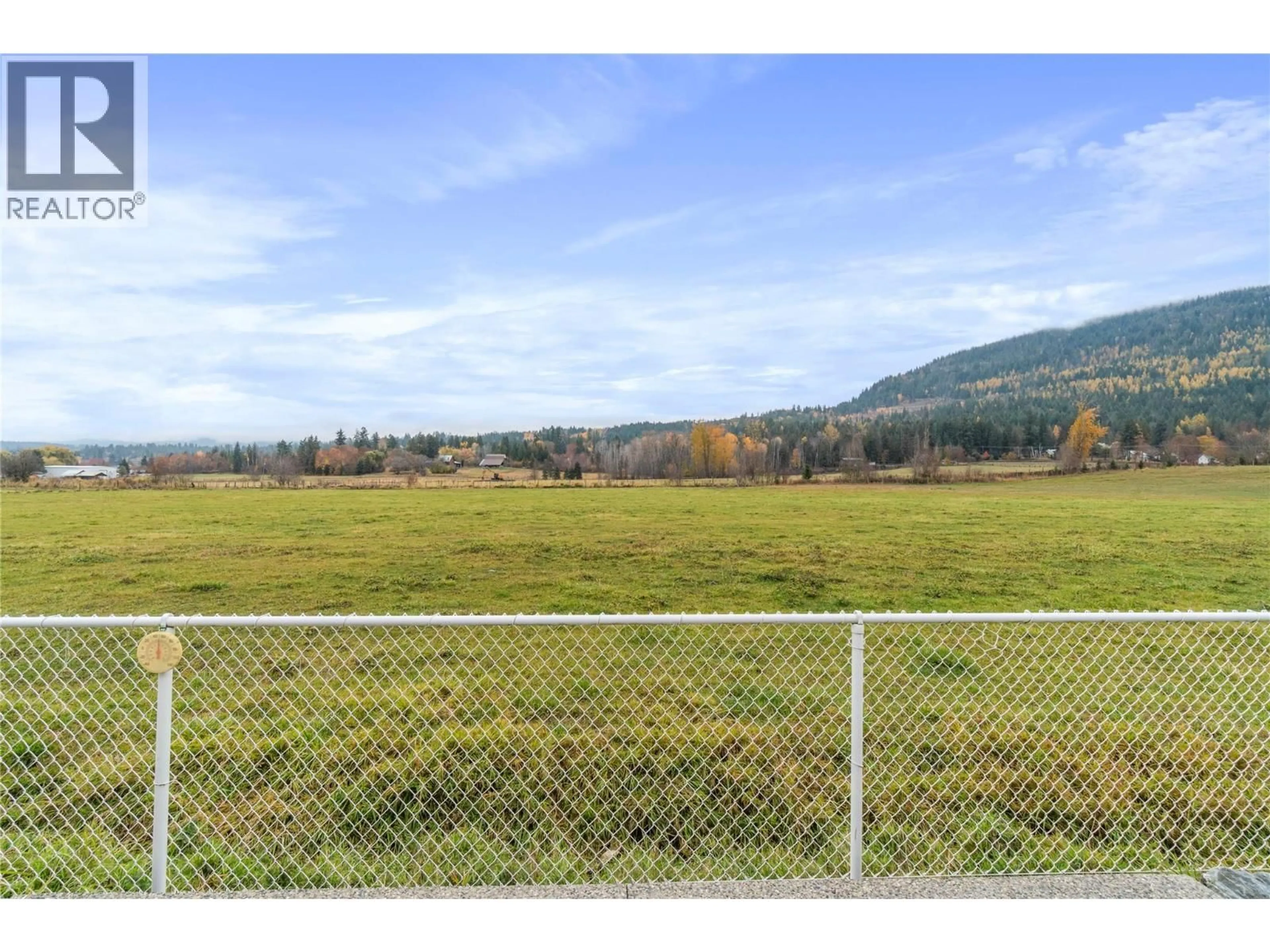 A pic from outside/outdoor area/front of a property/back of a property/a pic from drone, mountain view for 9 - 1330 10 STREET SOUTHWEST, Salmon Arm British Columbia V1E0E4