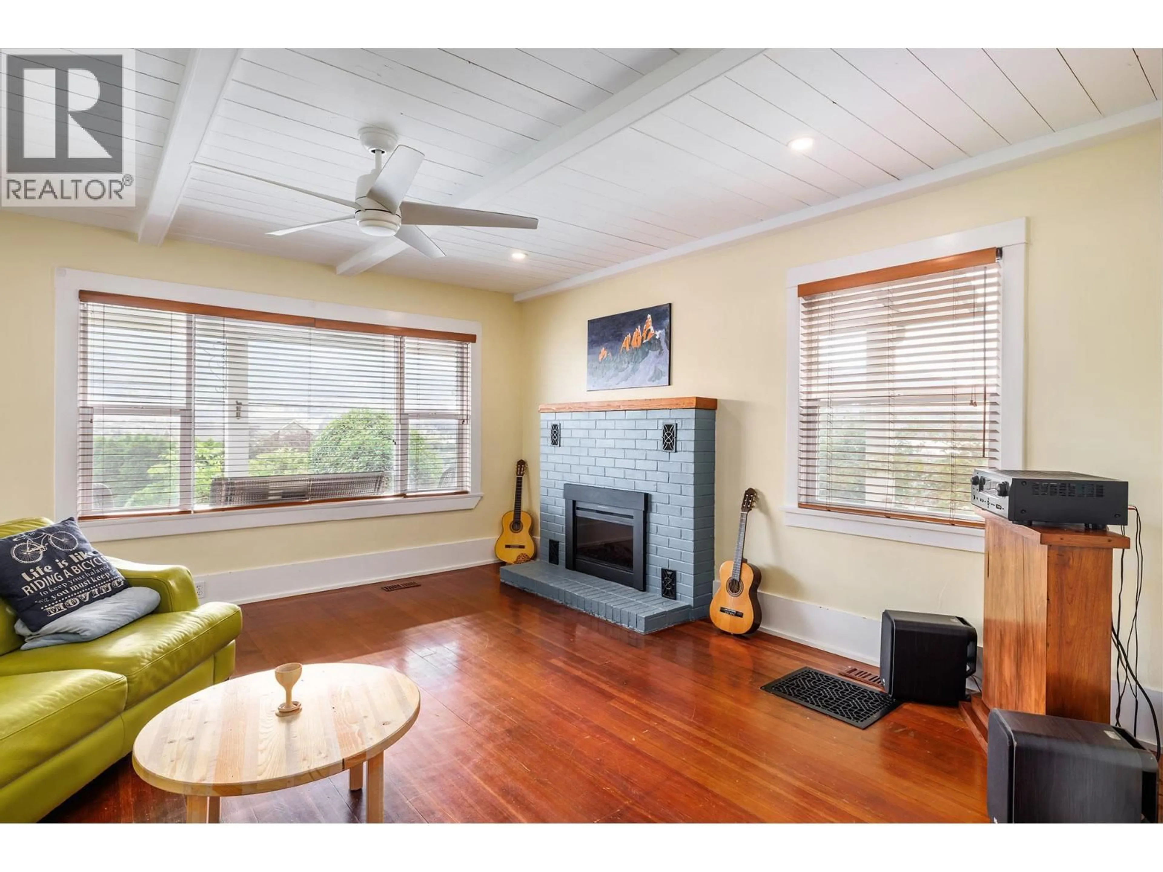 Living room with furniture, wood/laminate floor for 15818 OLD MISSION ROAD, Lake Country British Columbia V4V2G8