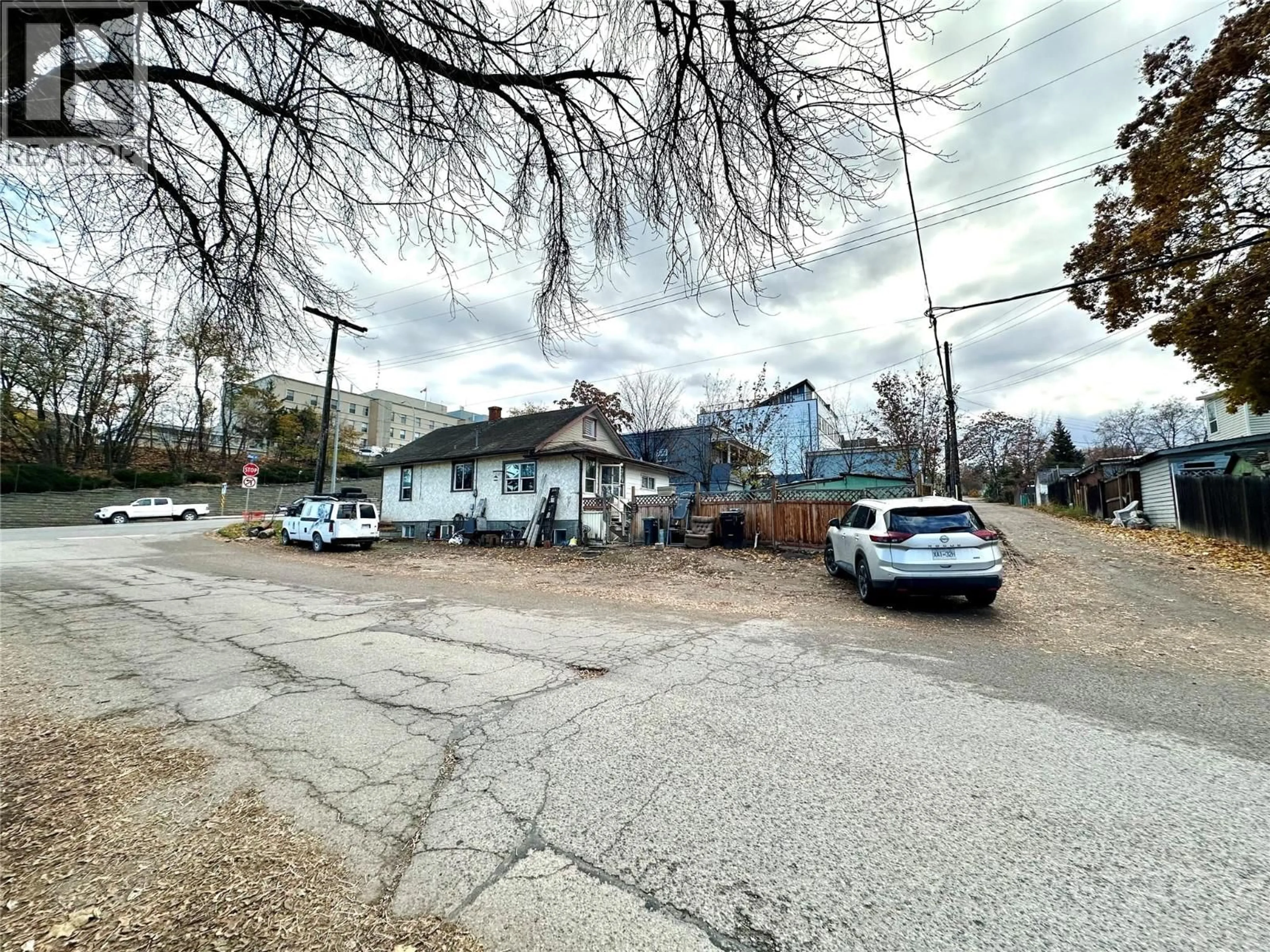 A pic from outside/outdoor area/front of a property/back of a property/a pic from drone, street for 2214 32 STREET, Vernon British Columbia V1T5L3