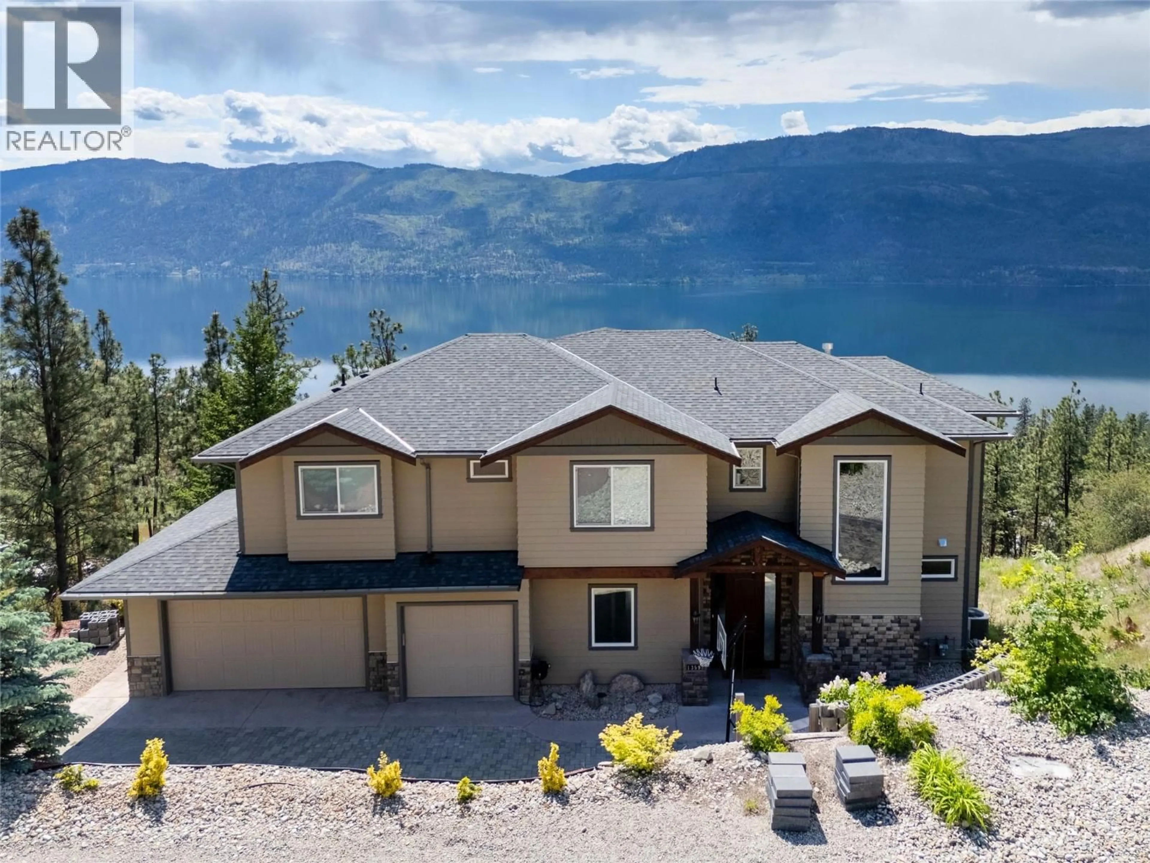 A pic from outside/outdoor area/front of a property/back of a property/a pic from drone, mountain view for 13598 TOWNSEND DRIVE, Lake Country British Columbia V4V2S8