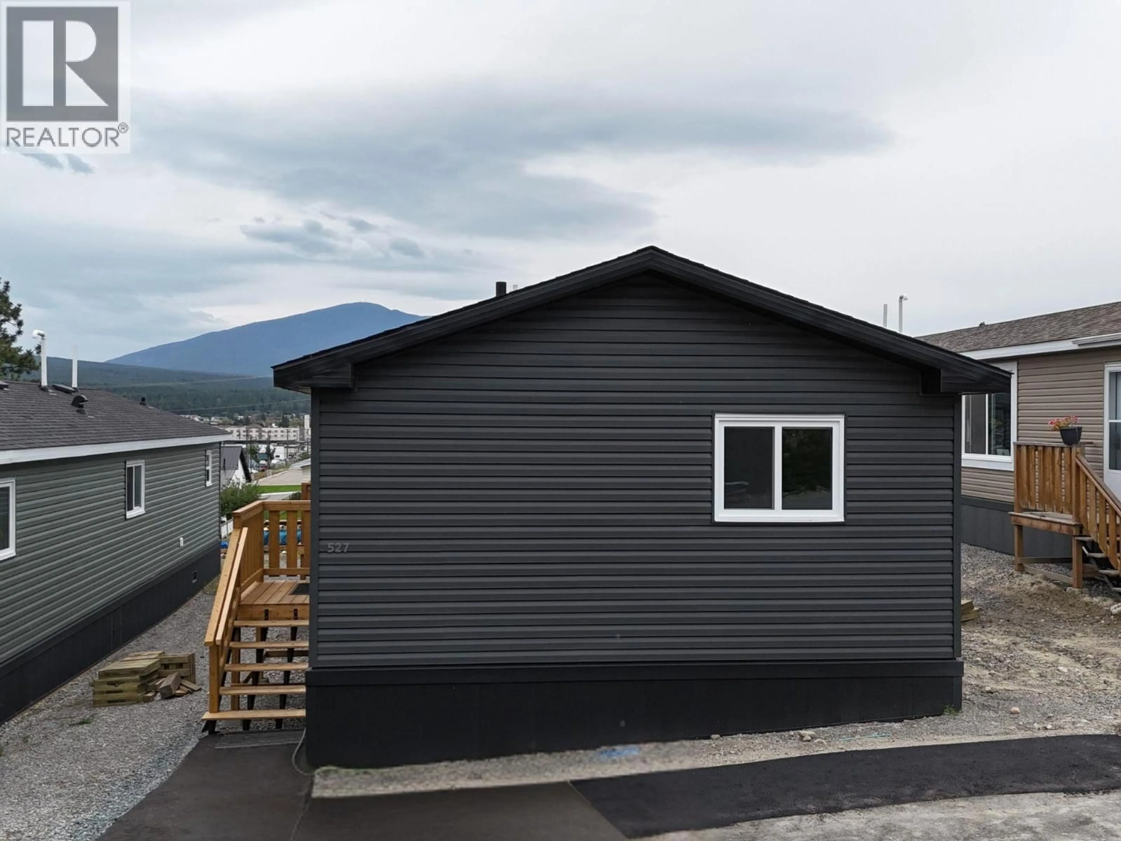 Home with vinyl exterior material, mountain view for 527 PAGURUT AVENUE WEST, Cranbrook British Columbia V1C0G5
