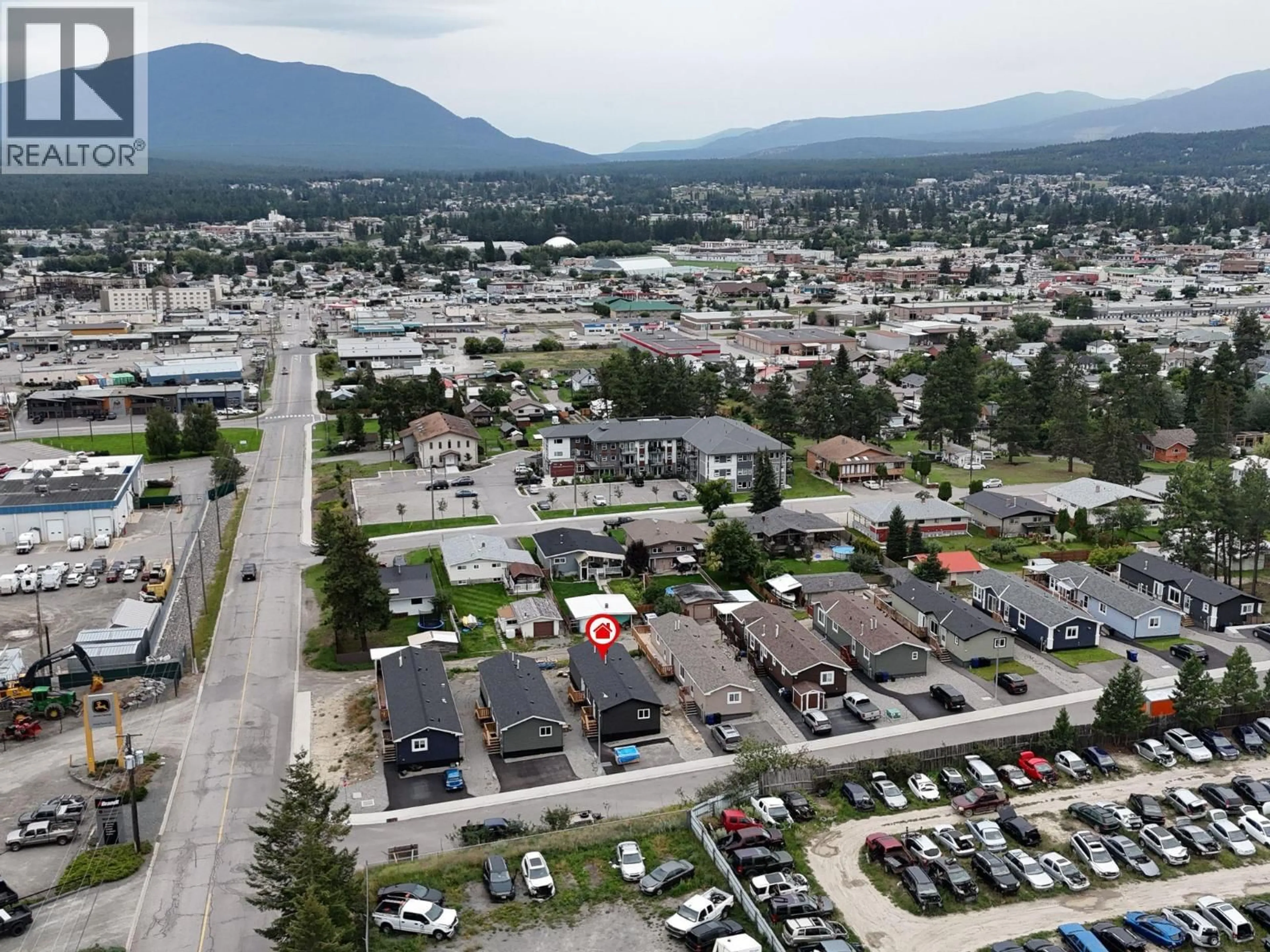 A pic from outside/outdoor area/front of a property/back of a property/a pic from drone, mountain view for 527 PAGURUT AVENUE WEST, Cranbrook British Columbia V1C0G5