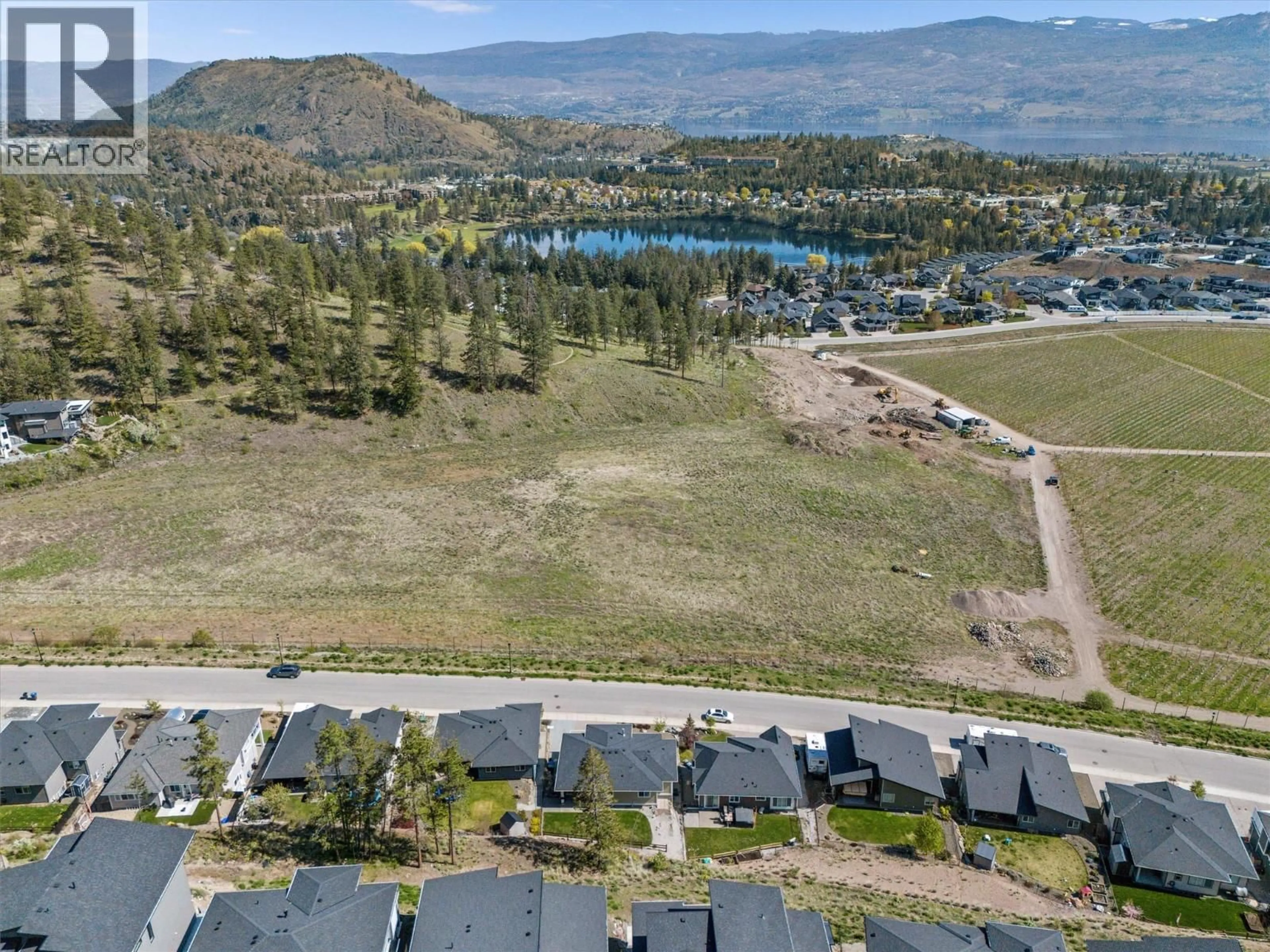 A pic from outside/outdoor area/front of a property/back of a property/a pic from drone, water/lake/river/ocean view for 2600 PARAMOUNT DRIVE, West Kelowna British Columbia V4T3M6
