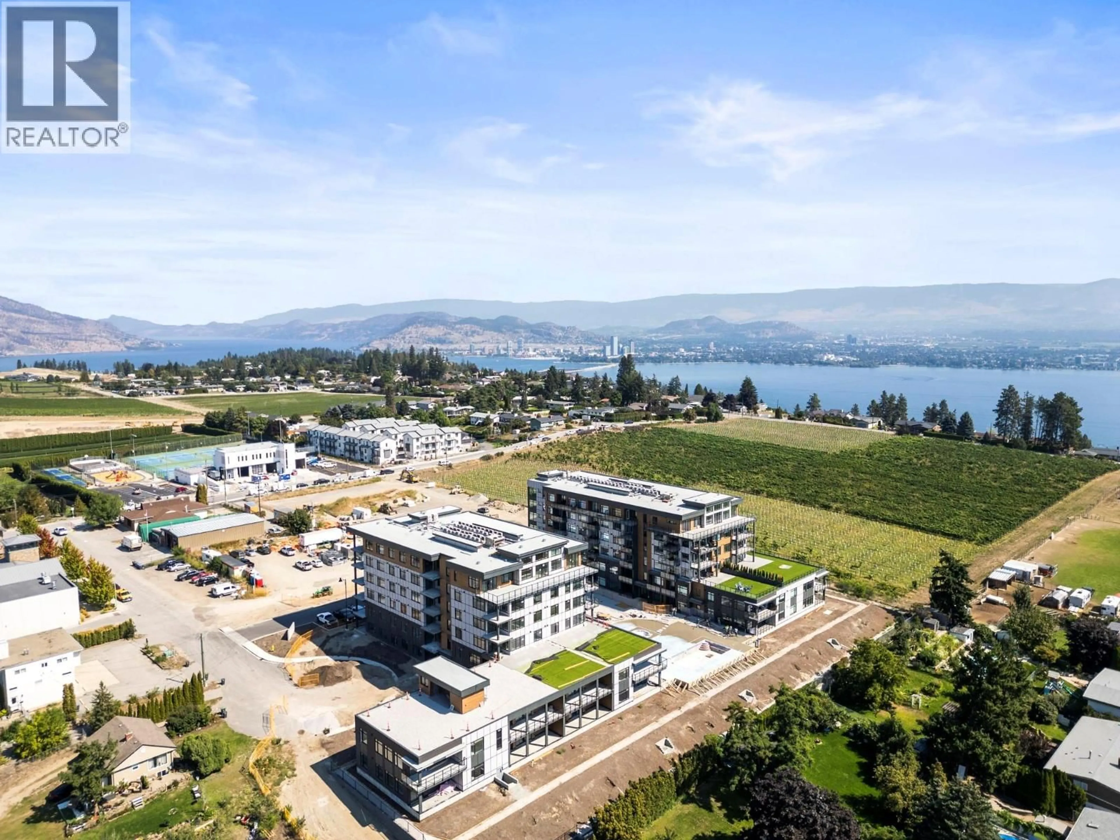 A pic from outside/outdoor area/front of a property/back of a property/a pic from drone, mountain view for 207 - 2760 OLALLA ROAD, West Kelowna British Columbia V1Z2A9