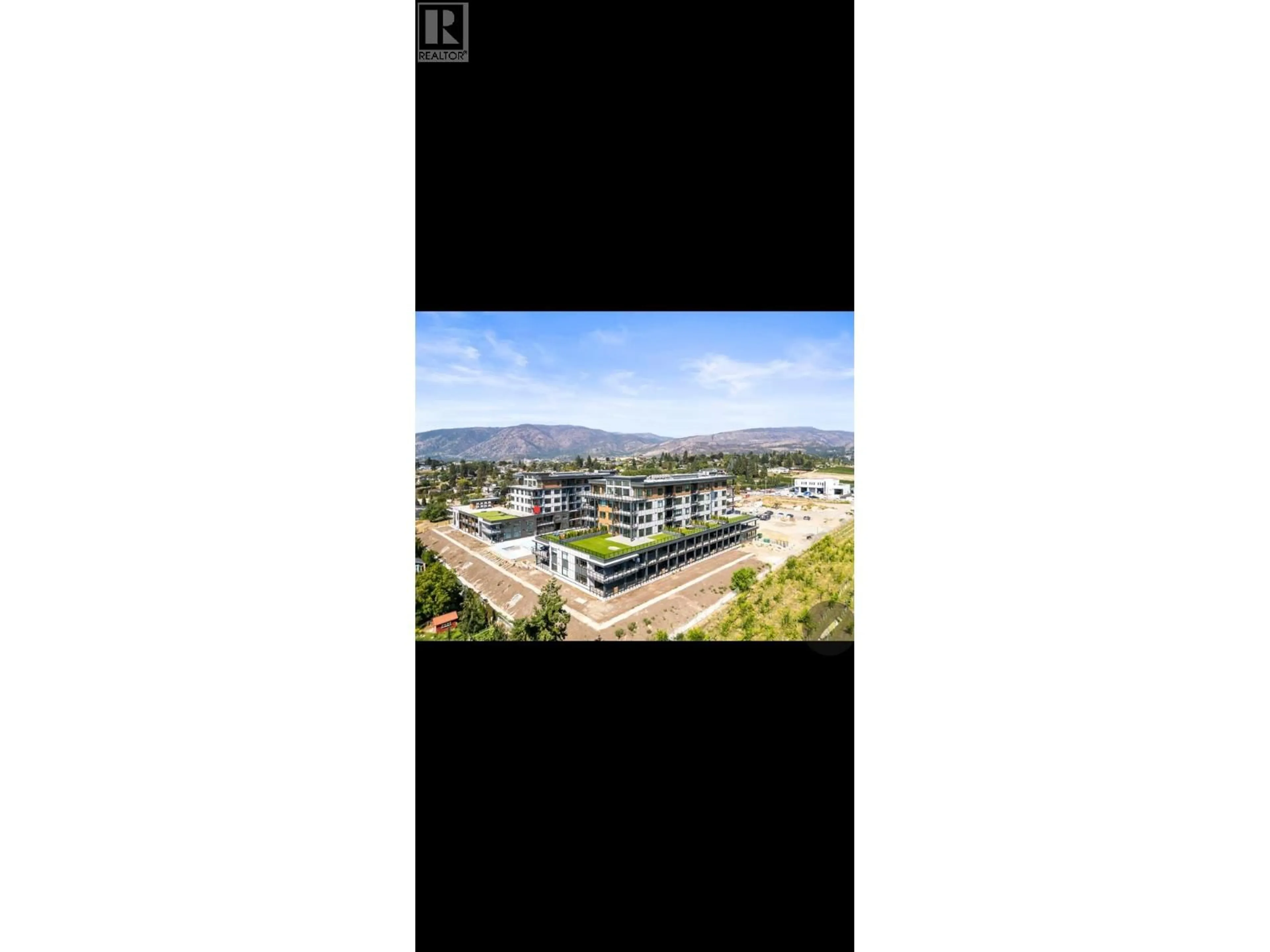 A pic from outside/outdoor area/front of a property/back of a property/a pic from drone, mountain view for 207 - 2760 OLALLA ROAD, West Kelowna British Columbia V1Z2A9