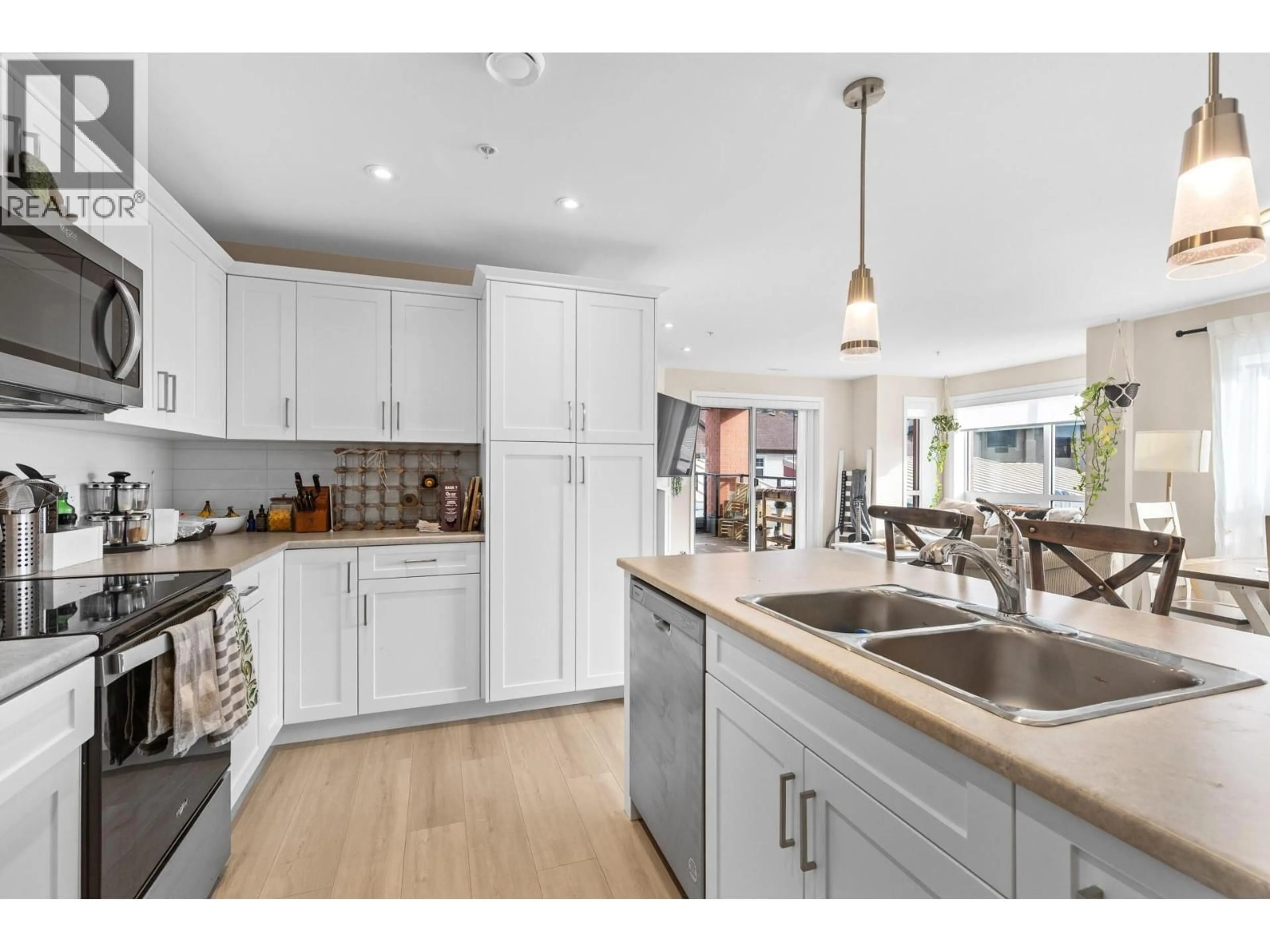 Open concept kitchen, unknown for 307 - 3362 SKAHA LAKE ROAD, Penticton British Columbia V2A6G4