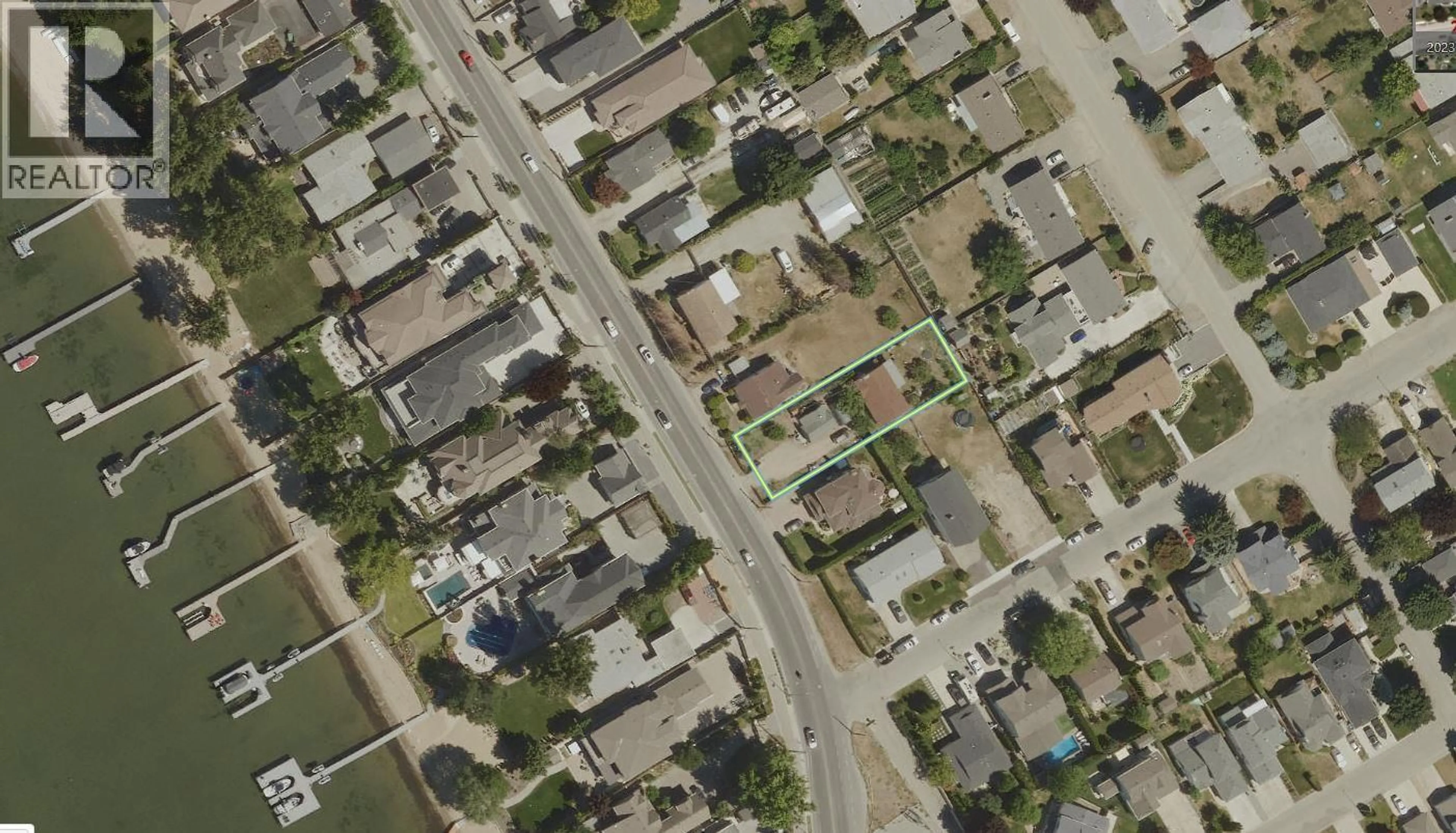 A pic from outside/outdoor area/front of a property/back of a property/a pic from drone, street for 3597 LAKESHORE ROAD, Kelowna British Columbia V1W3K1