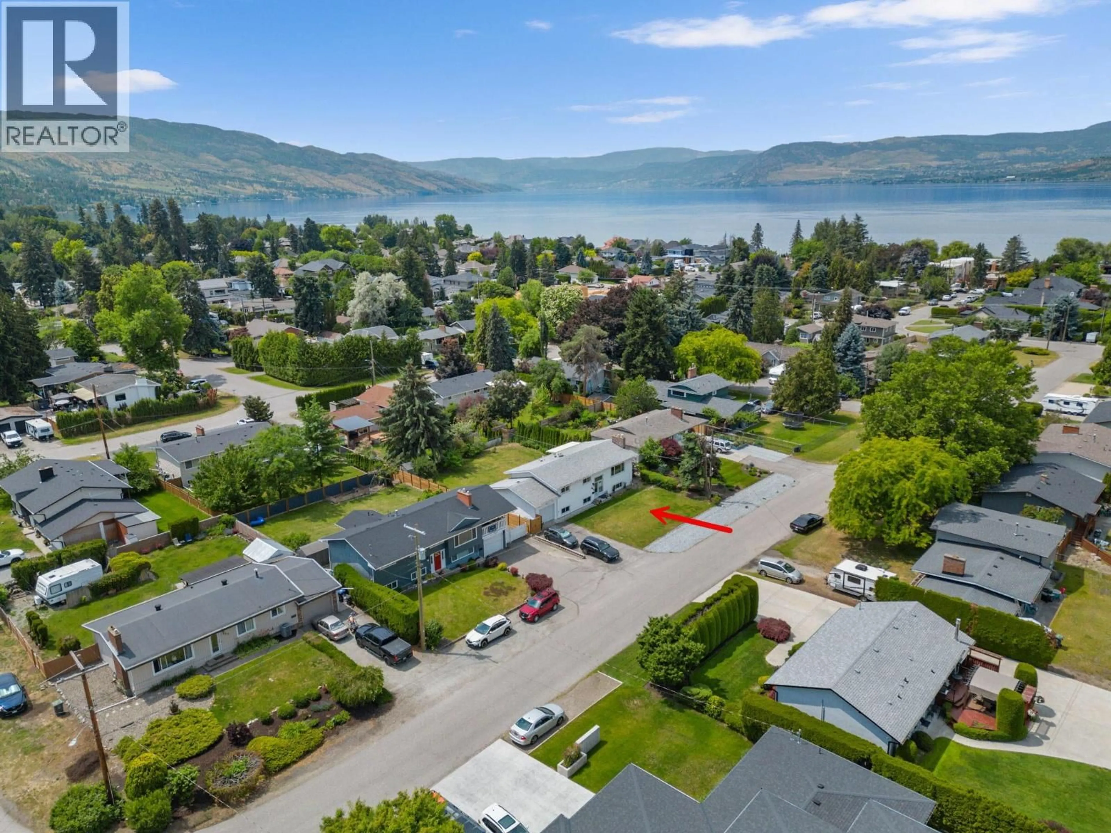 A pic from outside/outdoor area/front of a property/back of a property/a pic from drone, water/lake/river/ocean view for 449 BARKLEY ROAD, Kelowna British Columbia V1W1E4
